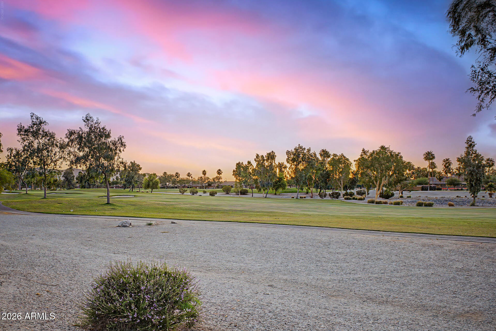 Golf Course Lot with Mountain Views.  Energy efficient Furnished Integra-block home with owned USA made whole house SOLAR.  You don't want to miss this stunning golf-course home in the highly sought-after Robson Ranch! The beautifully manicured landscape and 3-car garage with ceiling mount air conditioner are just the beginning! Step inside to fall in love with the bright and inviting living spaces showcasing tile flooring, elegant plantation shutters, tons of natural light, and a soothing palette that makes every space feel warm and welcoming. The kitchen is a chef's dream, offering abundant cabinetry adorned with crown molding, granite counters with matching backsplash, stainless steel appliances, a built-in desk, and a two-tiered island, perfect for midnight snacks and entertaining. Entire driveway of designer pavers.  Large Laundry room with cabinets and pullout drawers.  The serene main bedroom boasts rich wood floors, a bay window, a private exit for added convenience, and a bathroom with dual sinks and a separate shower & tub, plus a walk-in closet for easy organization. Spacious den ideal for an office or hobby area. Guest bath has a new walk-in Whirlpool tub with many features.  Enjoy the beautiful golf course views and gather with your loved ones in the backyard, offering a covered patio with an extended pergola, ideal for gatherings, well-laid pavers, and an exterior fireplace, perfect for late nights under the stars. An entertainer's dream! Make it yours now!  

Whole house water filter system and water softener, hot tub on patio and garage has a fast speed EV charger in garage and utility door.  Rain gutters, 3 security doors, awnings.  Huge paver patio w/Alumawood Patio Cover, gas fireplace and an amazing view.