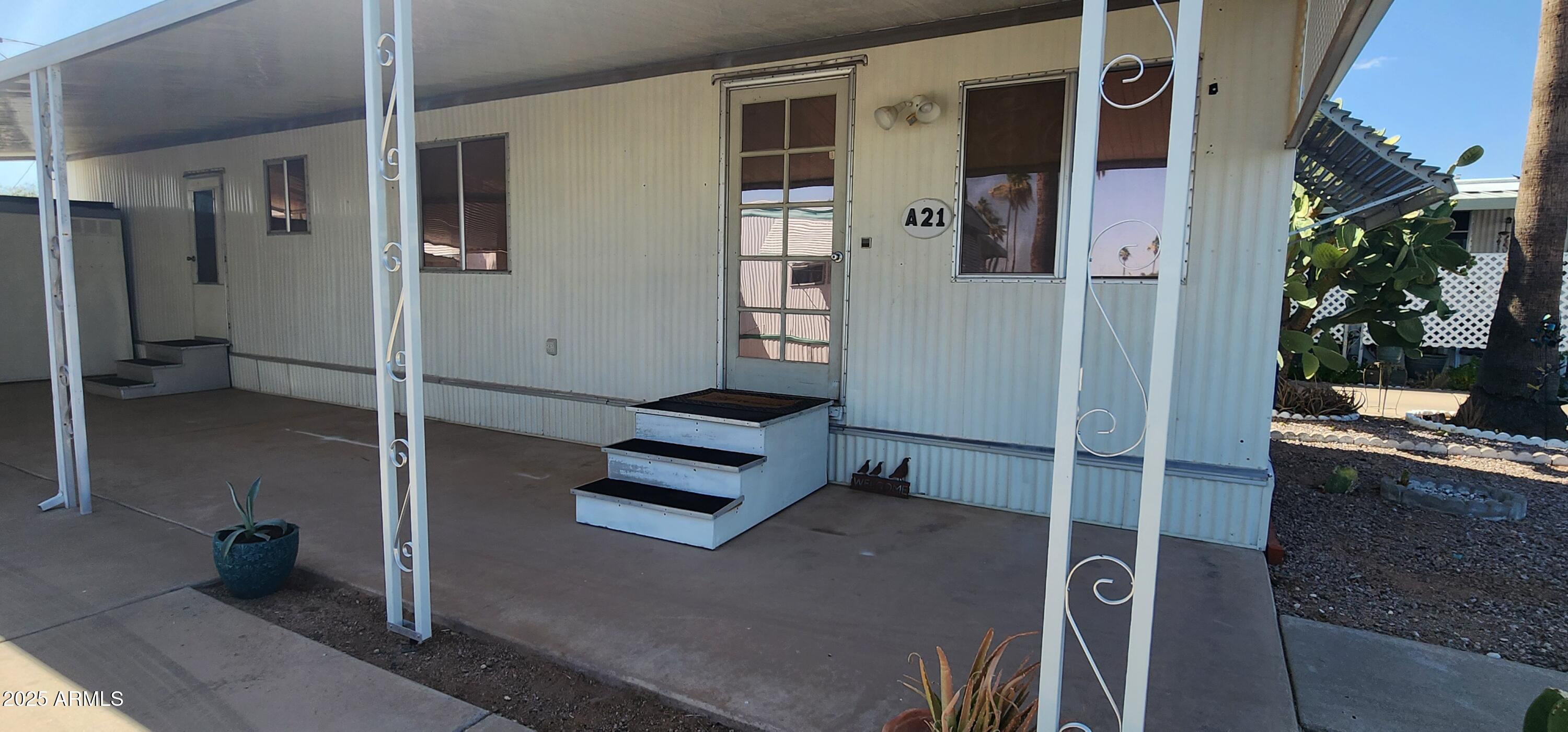 Age restriction 55+. Great layout for a 1 bedroom. Remodeled nicely, new laminate floors, new laminate countertop with stainless steel sink, gas stove, painted cabinets, 3 new AC mini splits - One in every room, nice and chilly, remodeled bathroom with new toilet, countertop and vanity lights.. 2 large sheds, covered carport. Plenty of sitting room out front and out back. Central location near freeway and shopping. Move in Ready!