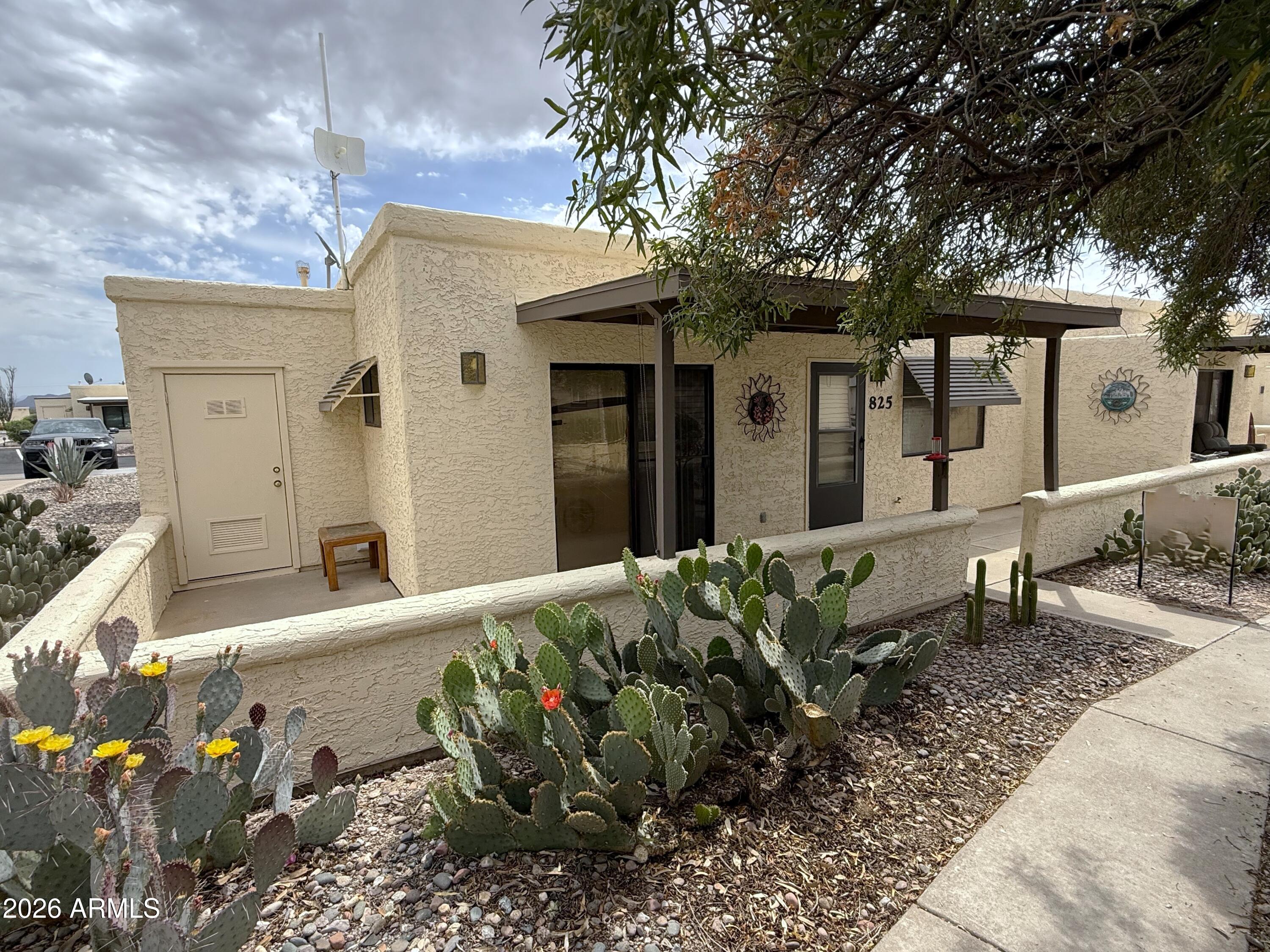 Welcome to Casita Hermosa, an active 55+ condo community in the heart of Historic Florence! This very well cared for, move-in ready furnished 1BR/1BA condo has it all. Updated kitchen has tile countertops, full-size appliances, and lots of space. Tile flooring throughout the home, living room has recliners and a futon couch. Bedroom has a queen under-storage bed and a large 3 door closet.  Full size washer & dryer are located in the shed, along with extra storage shelves.  AC and gas heat were updated in 2019, and there's a hot water circulating pump on the water heater.  This unit is clean, and you'll enjoy all the amenities of the Florence Gardens clubhouse as part of the HOA fees! This includes the pool, spa, clubhouse, annex, and pickleball!