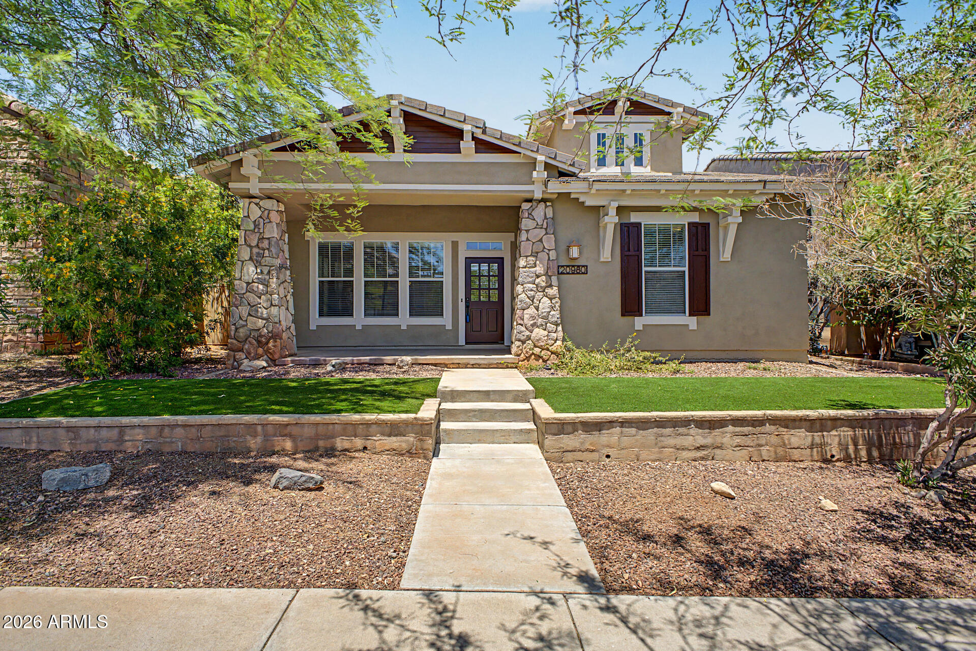 Presenting this adorable 3-bedroom home, thoughtfully designed to offer comfort and a delightful lifestyle! Perfectly flowing living & dining room, along with the spacious great room, are made for entertaining and everyday living. Fresh paint, a blend of tile & carpet flooring, pre-wired surround sound, window blinds, and tons of natural light create a warm, inviting atmosphere. Upscale kitchen boasts glossy stainless steel appliances, white cabinets & cupboards, a pantry, desk area, granite counters, and a prep island with a breakfast bar. Impeccable main bedroom provides a private bathroom with dual sinks and a walk-in closet. Open double doors to find a flexible den ideal for a playroom, office, or additional bedroom. Unwind under the covered patio while enjoying your favorite drink. PLUS! Exceptional Community amenities await. This gem is move-in ready!