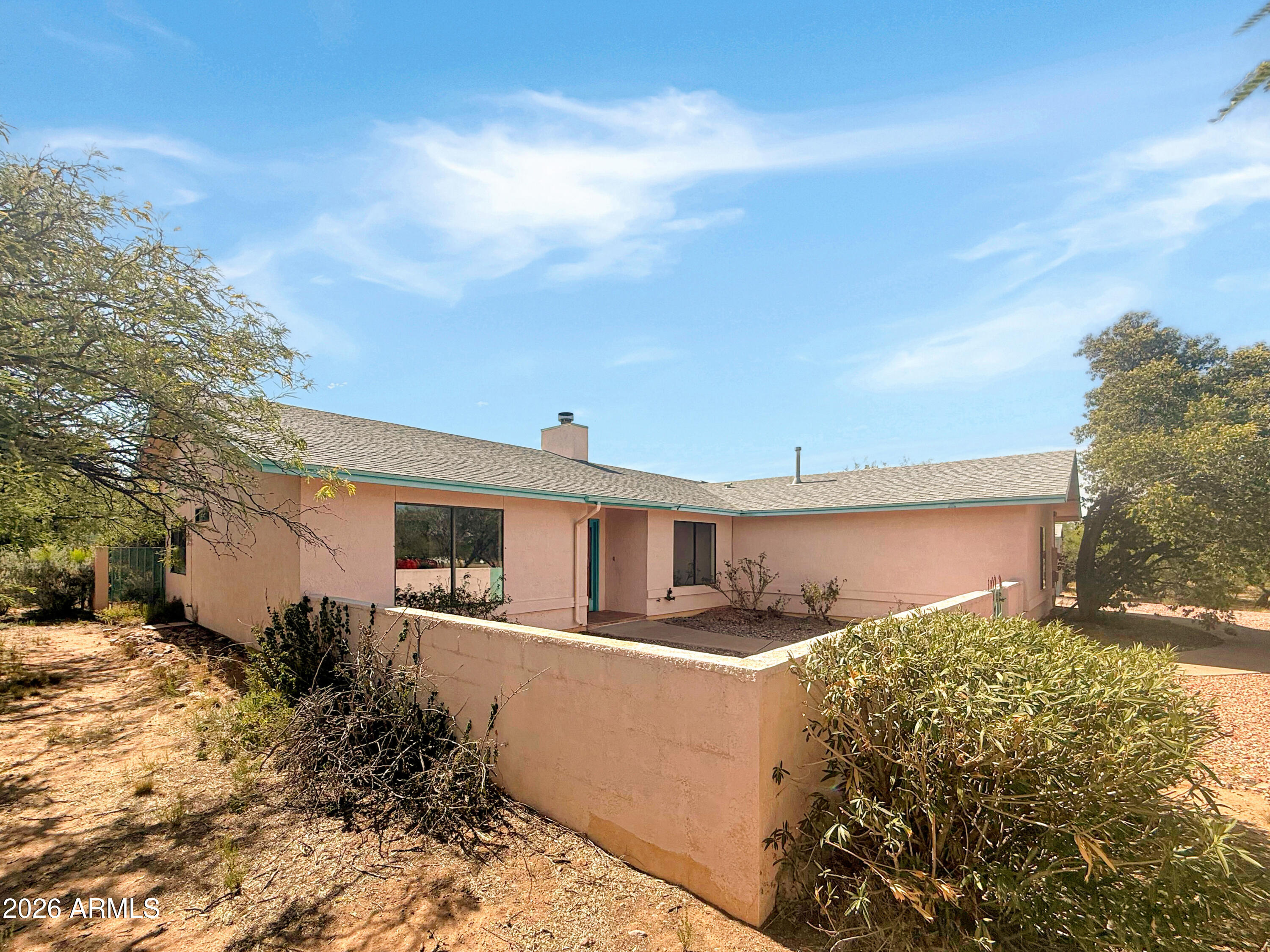 Welcome to 6340 S Calle De La Mango, a recently updated residence featuring fresh interior paint throughout. The kitchen contains all stainless steel appliances, complementing the inviting atmosphere of the central living area, which includes a fireplace. Outside, the fenced in backyard encompasses a refreshing in ground pool. This updated property is ready for comfortable living and outdoor enjoyment.. Included 100-Day Home Warranty with buyer activation