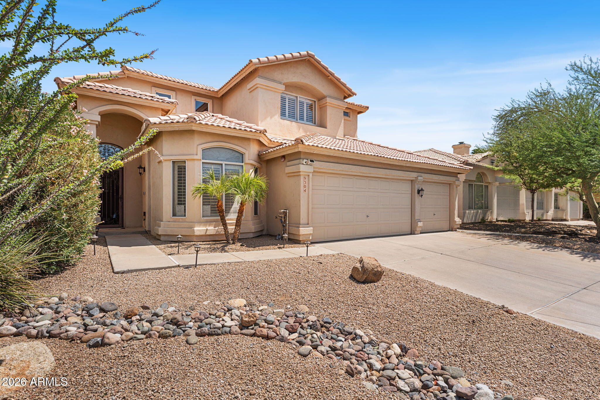 Beautifully updated 4-bedroom home w/ a 3-car garage in a prime Scottsdale location. Thoughtfully remodeled w/ high-end finishes throughout, this home features an open floor plan, soaring ceilings, abundant natural light & McDowell Mountain views. The chef's kitchen offers granite slab countertops, custom cabinetry, double ovens, stainless steel appliances & plantation shutters throughout. Enjoy a gas fireplace, surround sound and a spacious primary suite w/ dual walk-in closets. Upstairs secondary bedrooms share a Jack-and-Jill bath. Low-maintenance backyard with desert landscaping, artificial turf and the most gorgeous shad tree you've ever seen! Conveniently located near shopping, dining, top-rated schools, and the Loop 101.