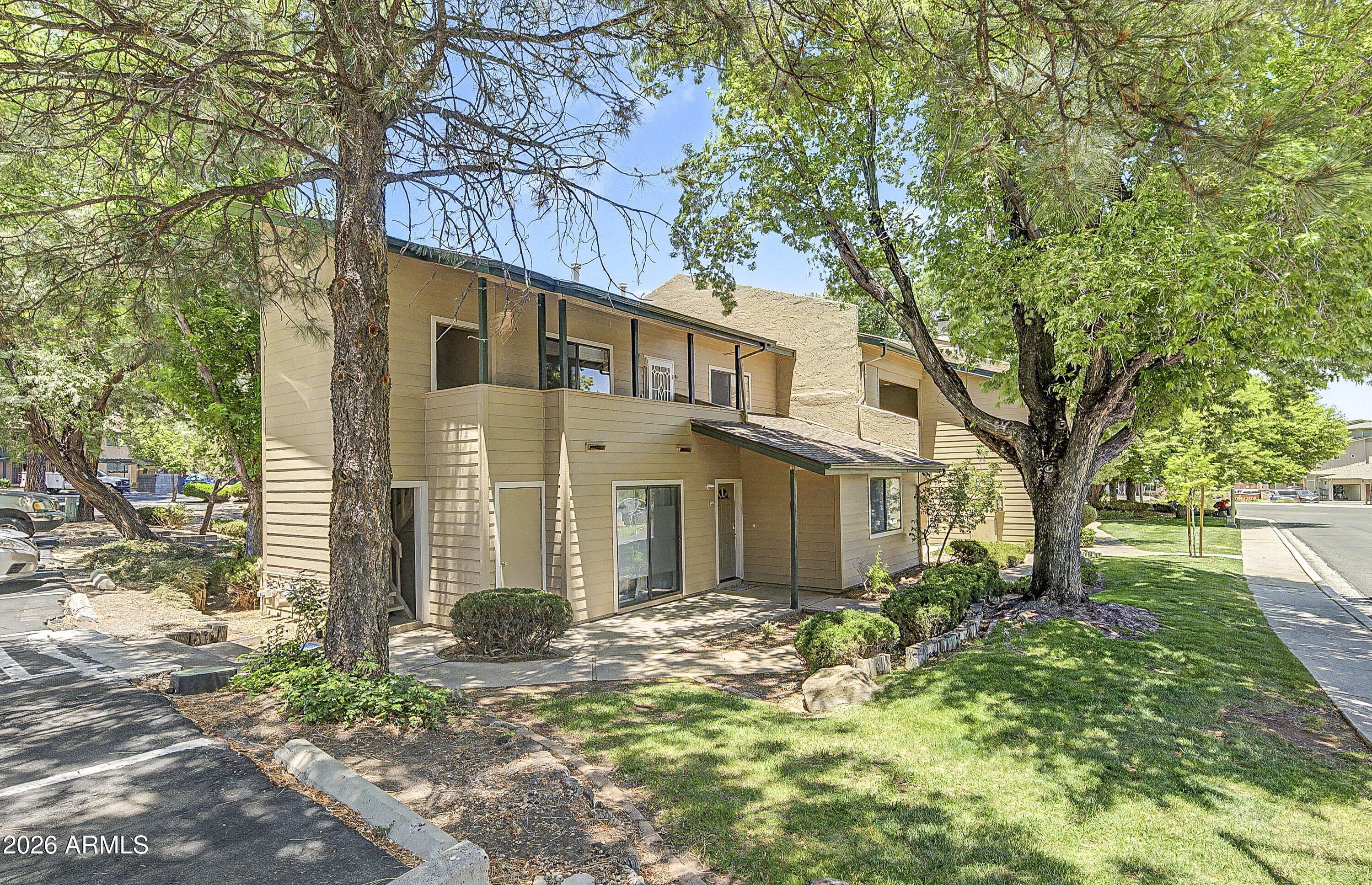 University Heights Dr N. Left on Litzler. It is the first right into the development. First upstairs condo on your left.
Public Remarks:
This upstairs end unit has a private entrance and balcony. There are 1,051 Sq Ft of comfortable, spacious living. Unlike other Village Condos, this unit has an open concept, with a larger living room and a separate laundry room with a full size washer and dryer. The ample sized kitchen has abundant cabinets and counter space, and offers a walk-in pantry. The bedrooms are spacious in comparison to other condos. The primary bedroom has a walk-in closet and its own private deck. Cable, internet, and water are included in the HOA fees. This condo offers an amazing layout with the advantage of its location!