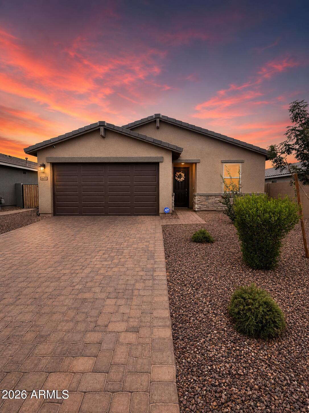 Barely lived in and better than new, this beautifully maintained 4 bedroom, 2 bath home offers modern style, comfort, and convenience on a premium lot with breathtaking views of the San Tan Mountains. The thoughtfully designed open-concept floor plan features a spacious primary suite, generous secondary bedrooms, and seamless living spaces perfect for both everyday living and entertaining. Step outside to a fully landscaped backyard complete with irrigated flower beds, providing a private outdoor retreat that's ready to enjoy. Skip the wait and added expense of new construction, this move-in-ready home already has the finishing touches you've been looking for while offering the feel of brand new.