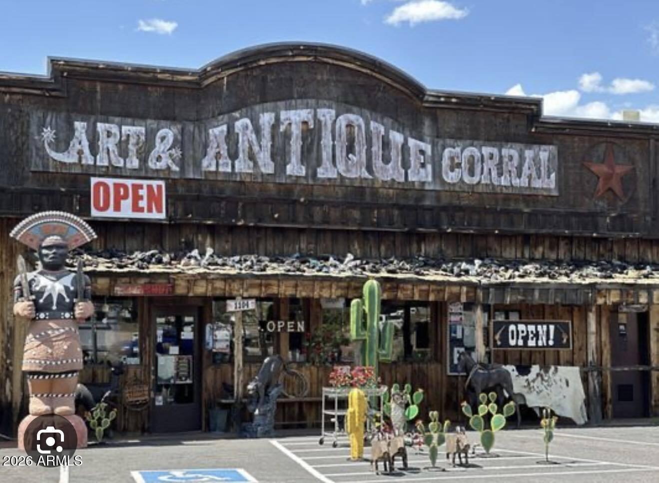 Prime commercial location on Payson's main corridor with excellent visibility along SR-87. High traffic counts, strong neighboring retail, and easy access make this site ideal for retail, service, or destination-based uses. Western Village--operating since 2001--has been a well-known attraction featuring antiques, Native American artifacts, ironwork, gems, jewelry, and unique collectibles. The family is now retiring and offering the property and inventory for sale. Personal property/inventory to be conveyed by separate Bill of Sale.