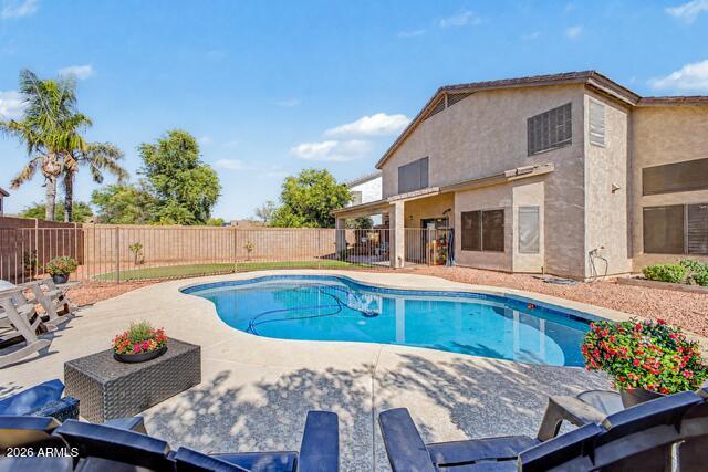 Stunning property in desirable Carino Estates!  Fall in love with the floorplan including a bedroom and full bath downstairs, formal living/dining room with dramatic vaulted ceilings, abundant natural light*Wood-look flooring*Gourmet kitchen comes with crisp white cabinetry, upgraded door 
hardware, new dishwasher & stove, recessed lighting, stainless steel appliances, an island, and a peninsula with a breakfast bar*French doors lead to the main suite w/dual sinks, garden tub, and two walk-in closets*Updated ceiling fans*Lovely backyard, which offers a covered patio, artificial turf, and a fenced pool for cooling down on hot summer days*Fresh  paint inside & out*Pebble tech pool w/new pool pump with extended pool decking*RV Gate* Mins from Loop 202, top schools, Intel... Downtown Chandler night life*2 Of the 4 bedrooms upstairs have walk-in closets*New blinds*