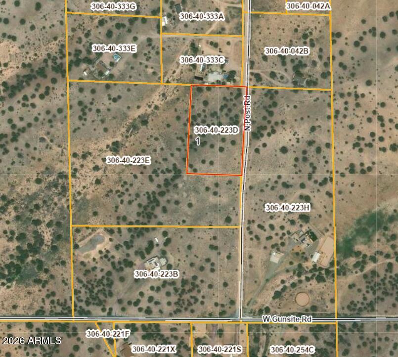Wide open space, endless skies, and room to live the way you want--this 3+ acre Paulden property delivers it all. Located on N Post Rd, this parcel offers easy access and a peaceful rural setting with natural vegetation and plenty of usable land. Whether you're looking to build a home, place a manufactured home, or create your own private getaway, this property gives you the flexibility to make it happen.  Bring your animals, your toys, and your plans--there's space here for all of it. Enjoy the quiet of country living while still being within a reasonable drive to Prescott for shopping, dining, and everyday conveniences. This parcel is also part of a multi-parcel bulk offering under MLS # 7034440