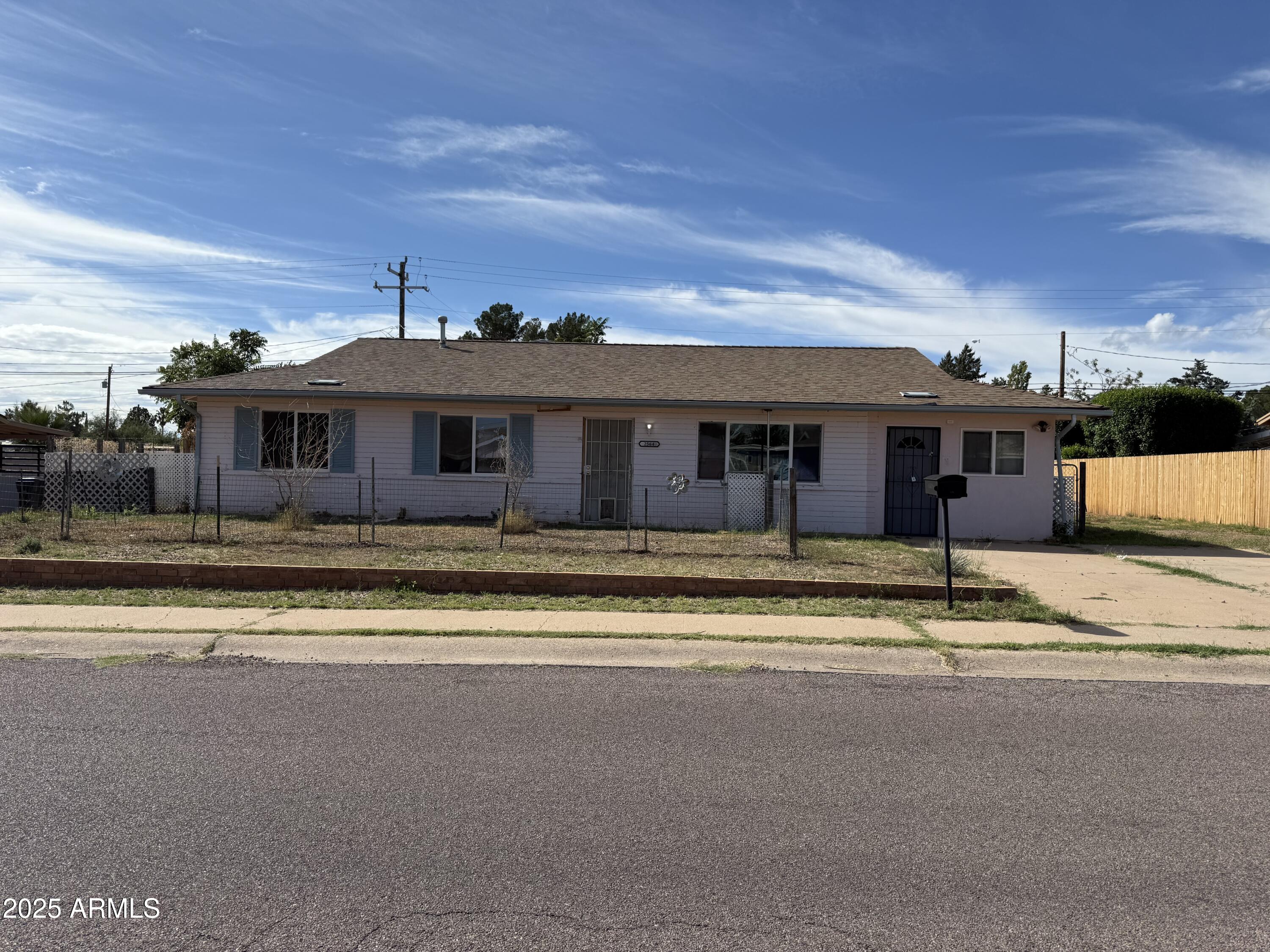 Are you looking for a great home to fix up? Look no further! This home has had some updates. The master bedroom and bath have some updates including a new vanity, sink and tile and lovely paint. The bedrooms have been textured and new paint. The living room area has been opened up and textured and painted. There is a god sized Arizona room as well as a laundry room, a dog washing room and room off the living room. Perfect for a home business. There is also newer gas furnace and central a/c.