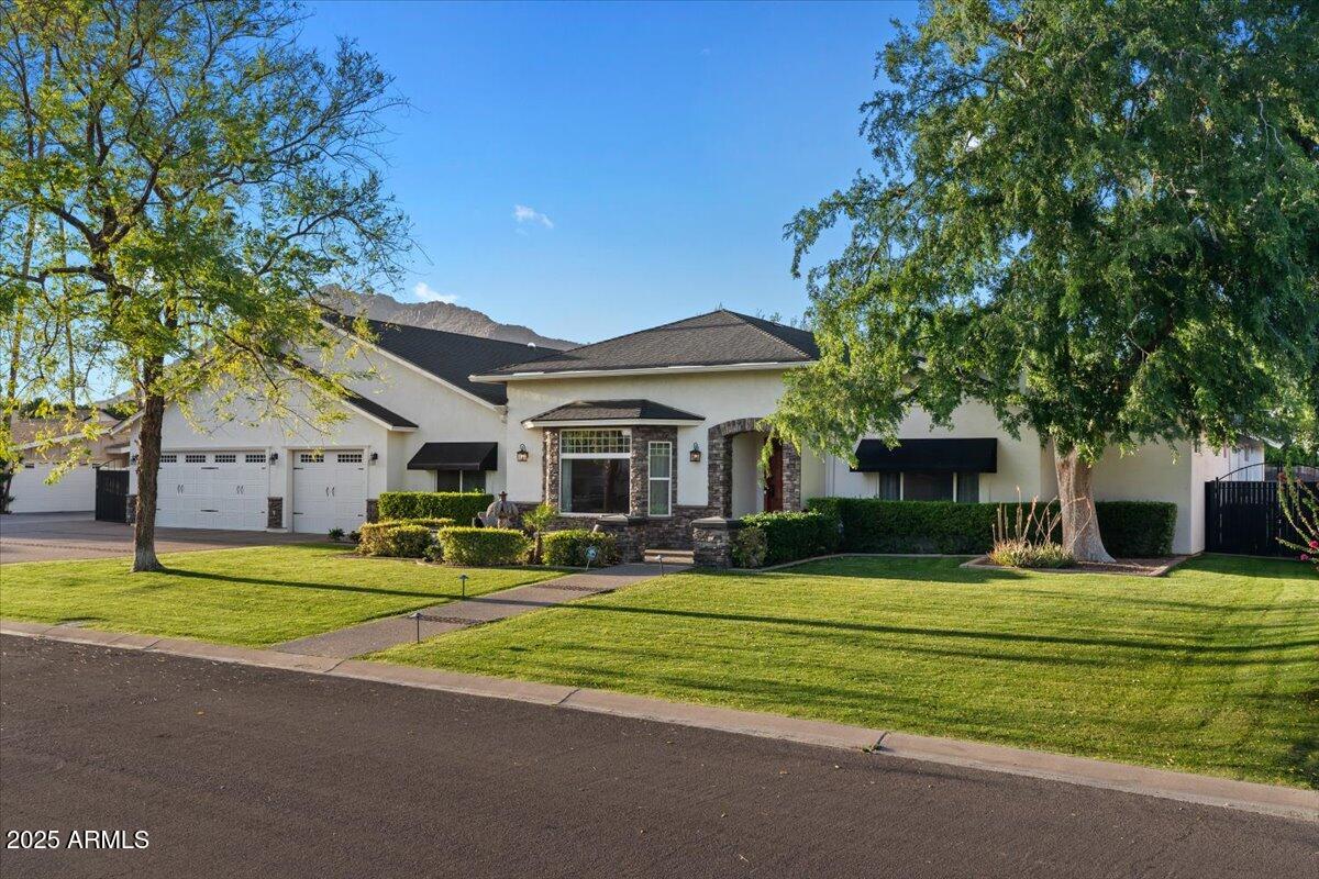 Situated in the highly sought-after Arcadia area of Scottsdale, this expansive six-bedroom residence offers a rare combination of space, flexibility, and long-term potential, including a layout well suited for multi-generational living options, in a location valued for its proximity to schools, outdoor amenities, and central access throughout the Valley.

The home is thoughtfully configured with six bedrooms under one roof, including a separate two-bedroom casita that functions as an integrated secondary living space. This flexible configuration supports multi-generational living arrangements as well as a variety of additional uses, such as guest accommodations, workspace needs, or expanded living flexibility, while maintaining privacy and connectivity within the home. Generous living areas, multiple gathering spaces, and strong indoor-outdoor flow support both everyday living and entertaining. The floor plan provides adaptability for a range of lifestyles and preferences, making it well suited for buyers who prioritize layout, usability, and location.

The residence has been well maintained and offers the opportunity to occupy comfortably while making updates over time, if desired. Finishes reflect a more timeless approach rather than short-term design trends, allowing future owners to personalize according to their own style and priorities.

Located within the Arcadia area, known for its established neighborhoods and convenient access to schools, dining, and recreation, this property presents a compelling option as a primary residence or long-term investment. This is an opportunity to secure a large, adaptable home in one of Scottsdale's most desirable areas, with the flexibility to support evolving household needs over time.
