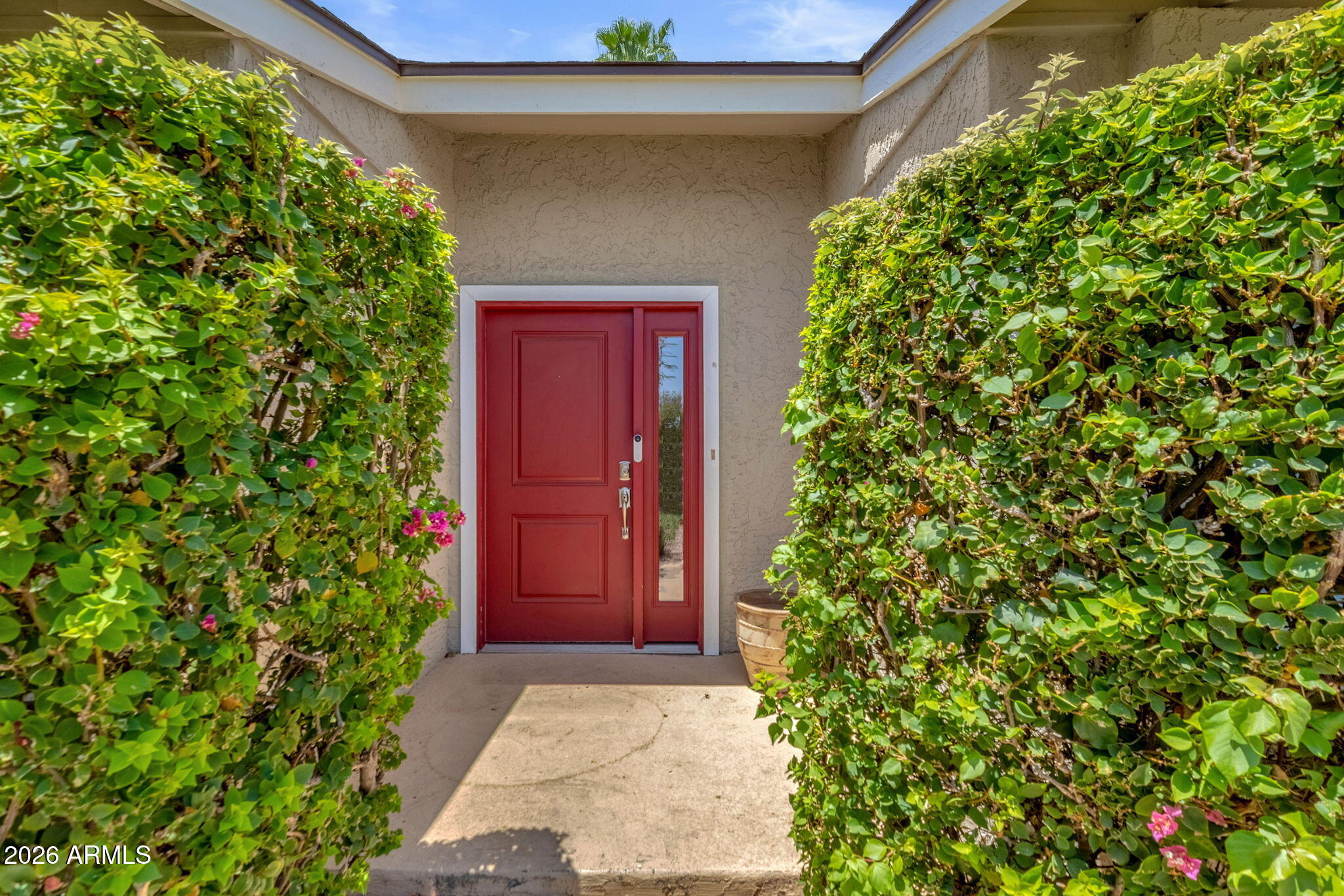 Beautifully updated home in the heart of McCormick Ranch featuring quality craftsmanship throughout. The spacious kitchen offers abundant cabinetry, granite countertops, a breakfast bar, and stainless-steel appliances and NEW AC! Hand-scraped wood floors, a cozy fireplace, and abundant natural light creating an inviting atmosphere. The primary suite includes a walk-in closet and beautifully updated bath, while the fourth bedroom with French doors makes an ideal home office or den. Enjoy a private backyard retreat with a large covered patio, grassy area, pool with water feature, and side yard with RV gate access. Surrounded by single-story homes for added privacy and conveniently located near the Greenbelt, Mountain View Park, Cochise Elementary, popular restaurants, and local coffee shops.