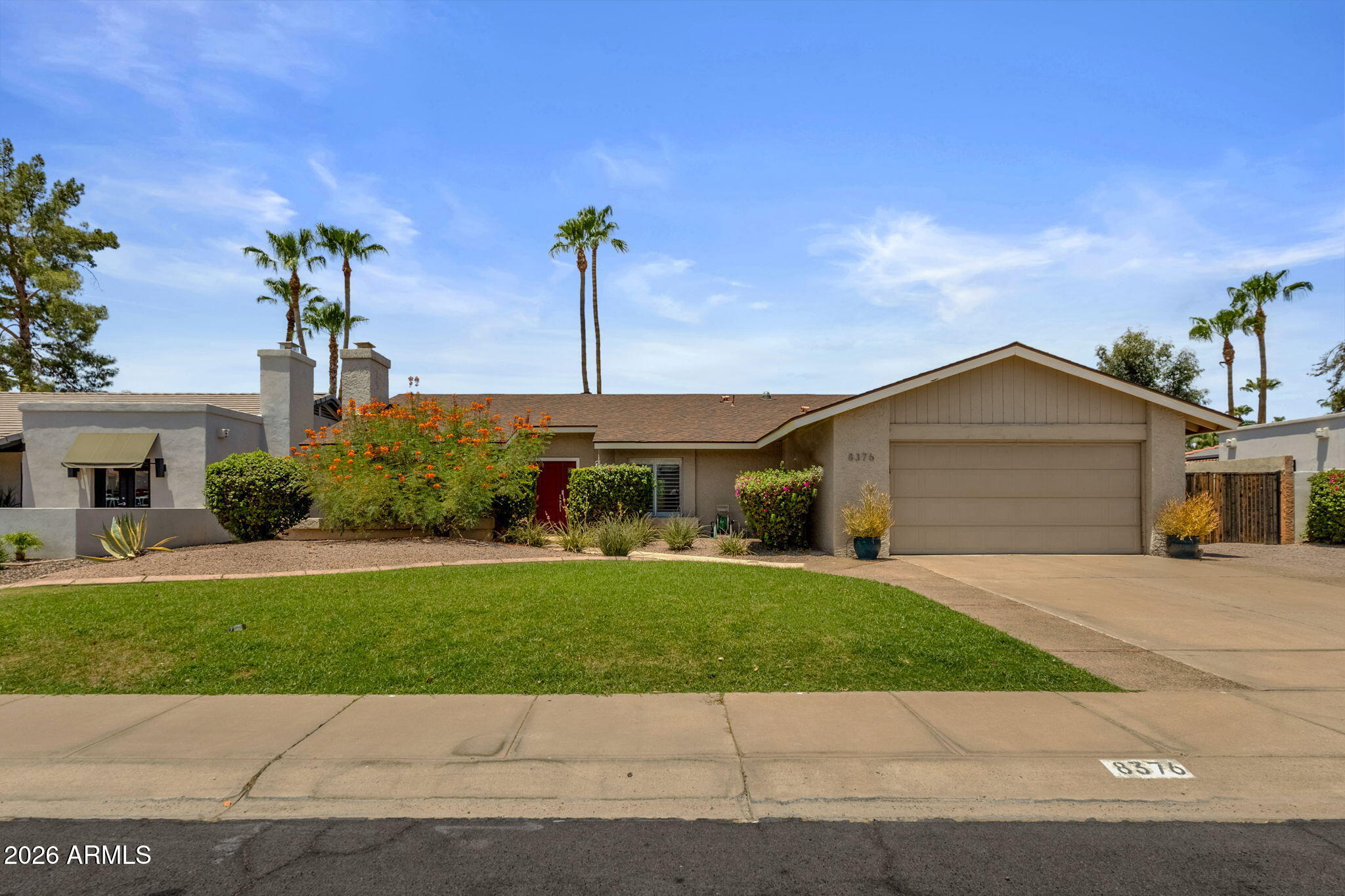 Beautifully updated home in the heart of McCormick Ranch featuring quality craftsmanship throughout. The spacious kitchen offers abundant cabinetry, granite countertops, a breakfast bar, and stainless-steel appliances and NEW AC! Hand-scraped wood floors, a cozy fireplace, and abundant natural light creating an inviting atmosphere. The primary suite includes a walk-in closet and beautifully updated bath, while the fourth bedroom with French doors makes an ideal home office or den. Enjoy a private backyard retreat with a large covered patio, grassy area, pool with water feature, and side yard with RV gate access. Surrounded by single-story homes for added privacy and conveniently located near the Greenbelt, Mountain View Park, Cochise Elementary, popular restaurants, and local coffee shops.