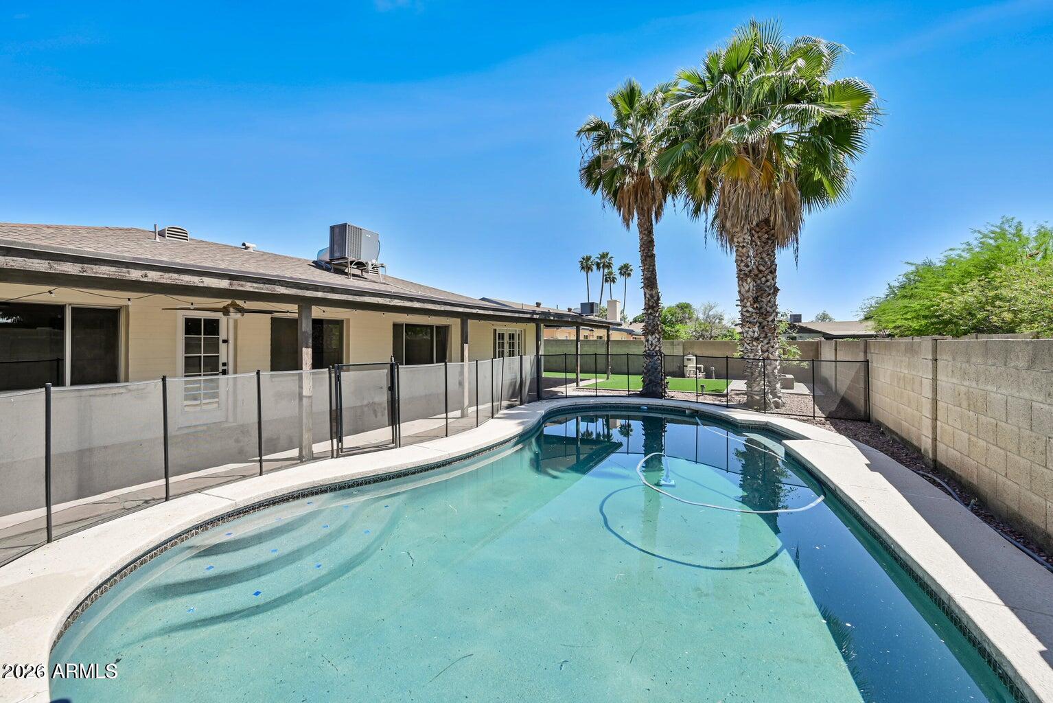 Welcome home to this spacious 4-bedroom, 2-bath rental in the heart of Tempe! This well-maintained home features an open floor plan, a bright living area, a modern kitchen with ample cabinet space, and generously sized bedrooms. The primary suite offers a private bath and plenty of closet space. Enjoy a large backyard perfect for relaxing or entertaining, plus covered parking and convenient indoor laundry. Located near shopping, dining, parks, major freeways, and just minutes from ASU, this home offers comfort, convenience, and an unbeatable Tempe location. Don't miss this fantastic rental opportunity!