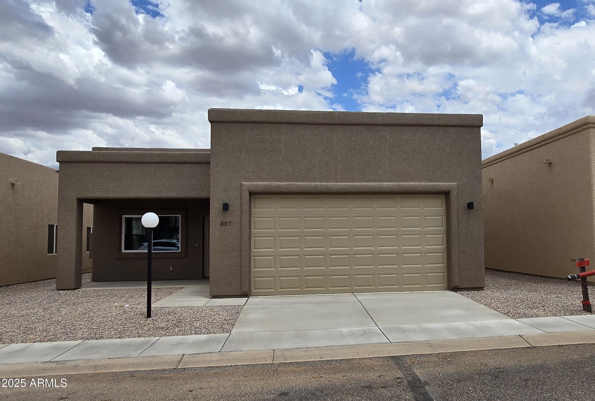 Brand new spec home is ready for new owners!  Fabulous 55+ active community with unrivaled amenities in Sierra Vista.
Upgraded interior includes 42'' cabinets, upgraded tile, quartz countertops, ADA toilets, 42'' wide hallways, 36'' doors to all rooms.  Property taxes and trash pickup are included in the resort fee as well as the road maintenance.  Lots of activities and classes, potluck dinners, bingo, billiards, ping-pong, card games at the card house, pickleball, yoga, swimming and hot tubbing.  Movie room complete with popcorn maker.  You're going to love this place! Roof is torch-down.