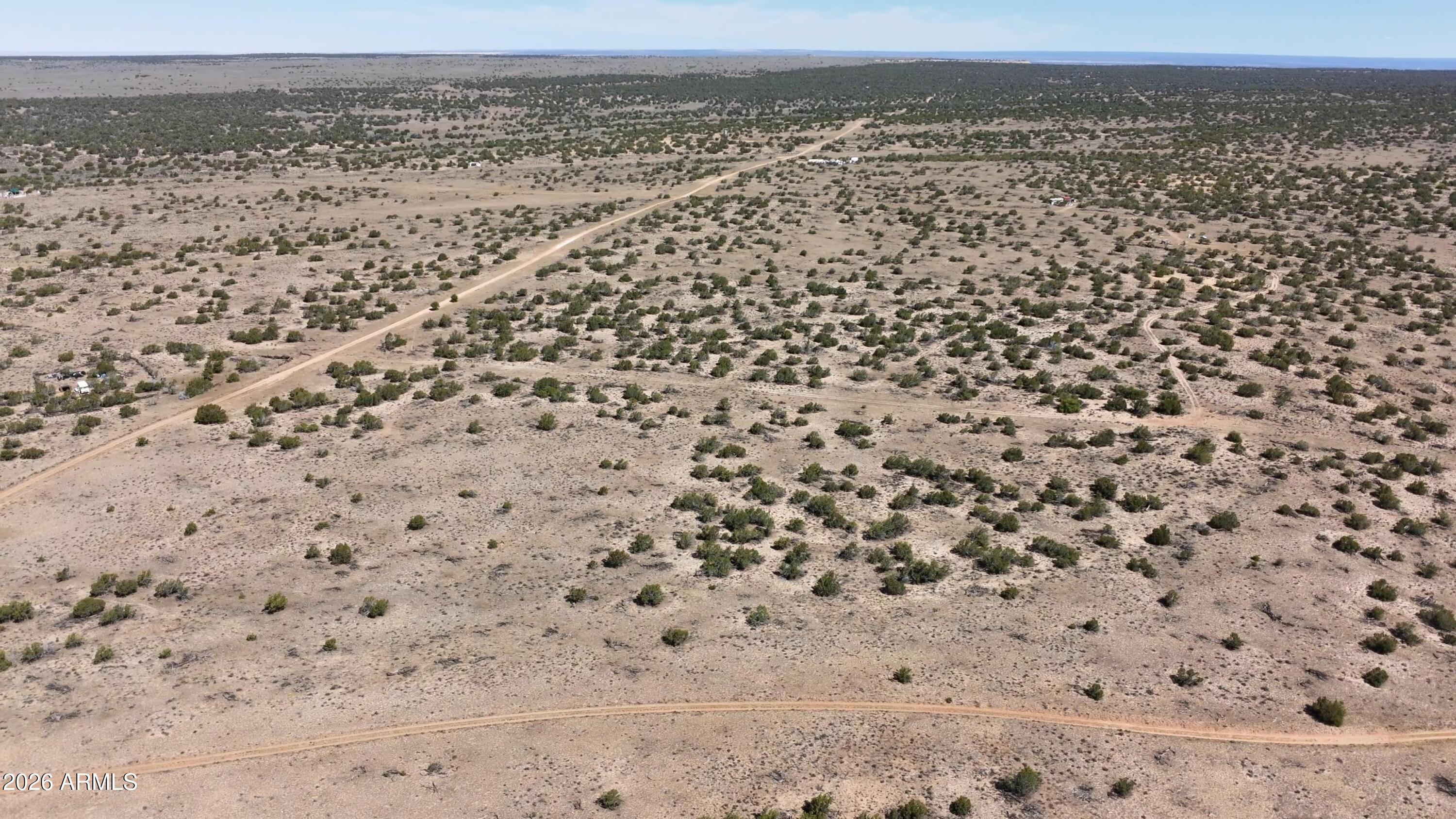 Escape to wide-open Arizona skies on this 9.374-acre parcel near Sanders, AZ. Conveniently located just off US Highway 191, this property offers easy year-round access, stunning desert views, and endless possibilities. Build your dream home, create a private camping retreat, park your RV, or hold as a long-term investment. Enjoy the peace and privacy of rural Arizona while remaining within easy reach of I-40 and nearby amenities. No HOA, plenty of room to roam, and beautiful star-filled nights make this an excellent opportunity for outdoor enthusiasts, homesteaders, and investors alike.