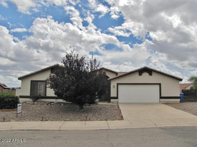 Come take a look at this beautiful 6 bedroom 3 full bathroom home in Coronado crossings on huge lot!! Beautiful backyard with freshly grown grass and several fruit trees and grape vines. Home comes with a $10,000 flooring allowance. You will love this spacious home close to shopping, Fort Huachuca, schools and hospital. RV gates on both sides of the home allow for storage or company. 240V, sewer clean out and water accessible on side of home.