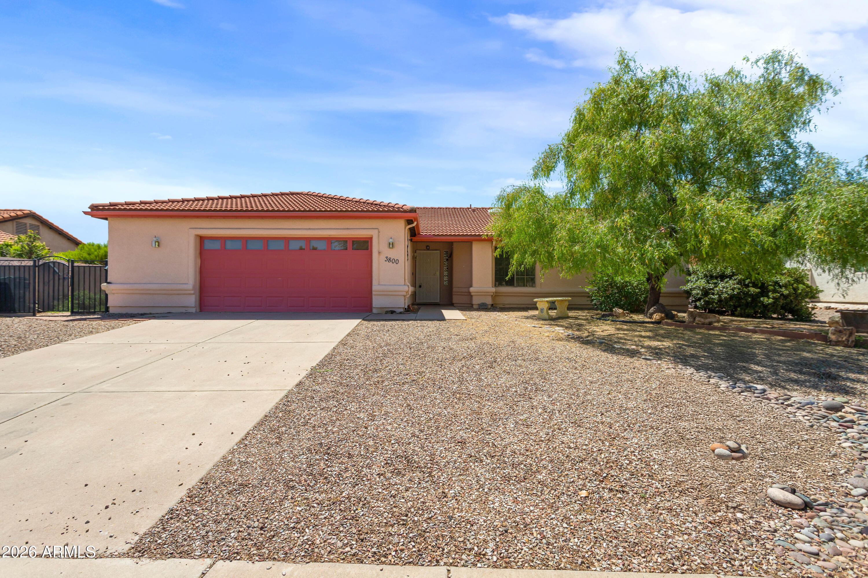 Spacious and well equipped, this 4 bedroom home offers functionality, comfort and plenty of extras! Enjoy a carpet free interior, beautiful kitchen with a moveable island, gas stove, dishwasher and plenty of beautiful granite counter space. This well maintained home features a bay window in the primary suite with dual sinks, bathtub and shower. Step outside to an extremely large covered back patio, with exceptional mountain views, beautifully landscaped with trees. The backyard has FOUR spacious wood sheds, with one of them including a cellar below, ideal for a wine cellar or additional storage. Additional highlights include a water softener, and a bonus storage room in the garage, equipped with shelving to make storage easy and convenient. OWNED SOLAR! A MUST see home!