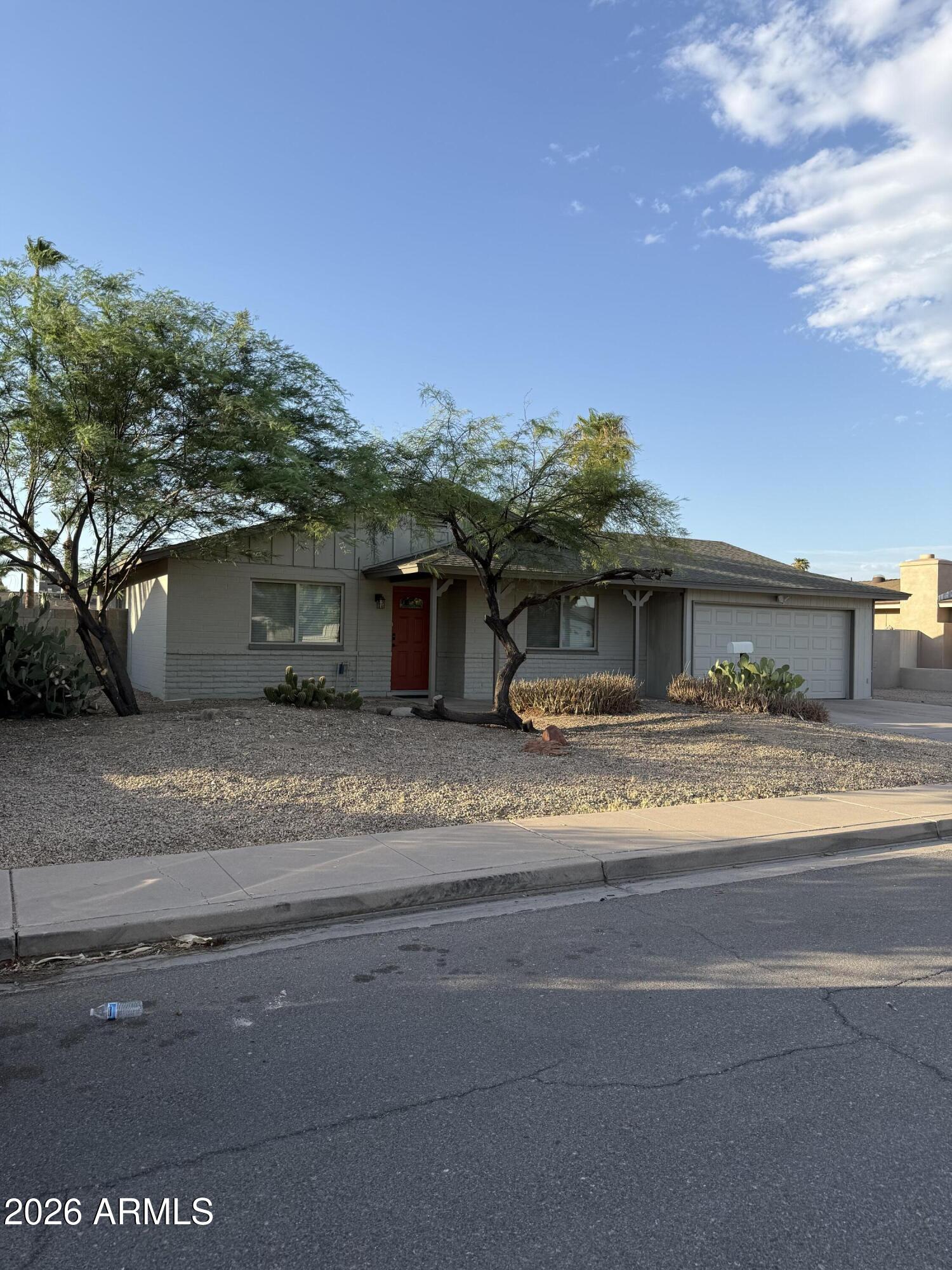 Move-in ready 3-bedroom, 2-bathroom home offering 1,346 square feet of comfortable living space in a convenient location close to ASU. Fresh interior paint and brand-new carpet create a bright, welcoming atmosphere, while the functional floor plan provides spacious living areas and well-sized bedrooms. The low-maintenance desert landscaping adds curb appeal and makes outdoor upkeep easy, giving you more time to enjoy your home. Whether you're a first-time homebuyer, looking to downsize, or seeking an excellent investment opportunity, this property offers comfort, convenience, and a desirable location just minutes from Arizona State University, shopping, dining, and major commuter routes. NO HOA!