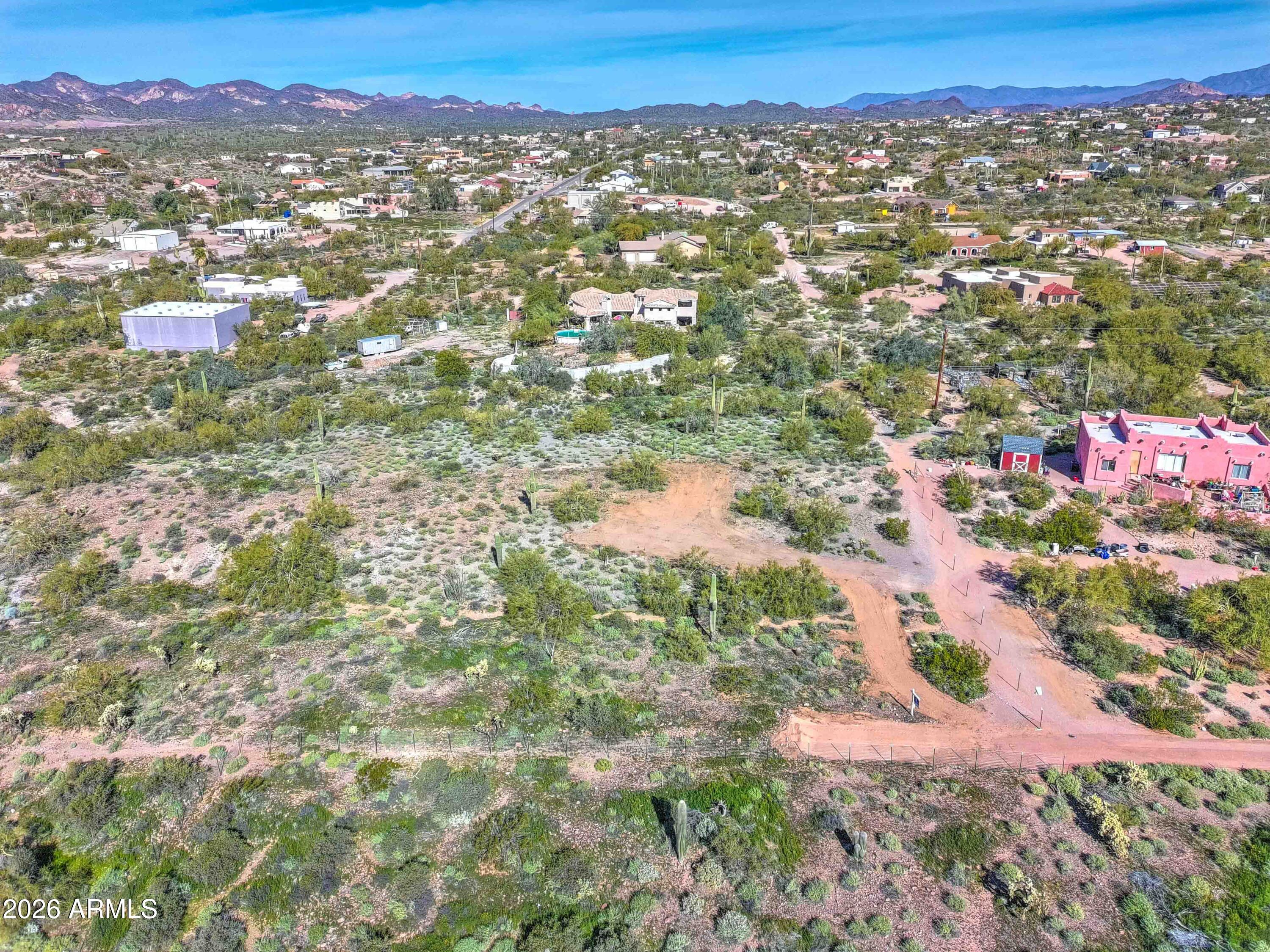 Experience breathtaking sunrises and sunsets from this stunning 2.5-acre parcel. Tucked away for privacy and tranquility, this property offers unobstructed views of the majestic Superstition Mountains and the beauty of the surrounding Sonoran Desert. Enjoy hiking, biking, and horseback riding right from your doorstep. Just minutes from the historic Apache Trail and Canyon Lake, you'll embrace a true rural lifestyle without sacrificing convenience -- shopping, freeways, airports, and the Phoenix/Scottsdale metro area are all within easy reach.