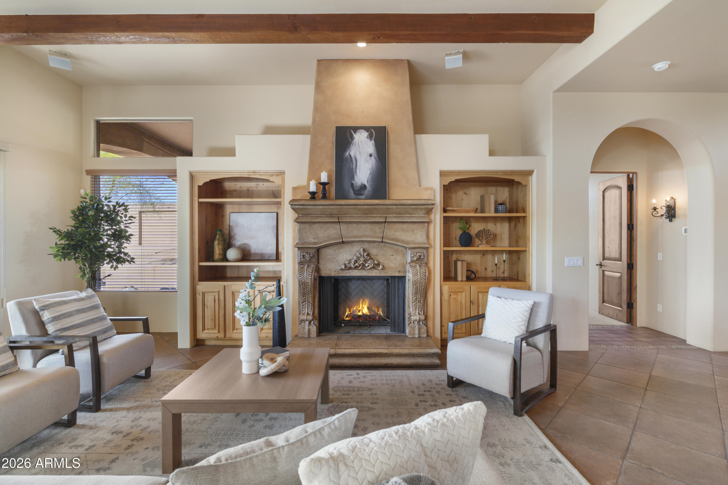Built for the buyer who needs space beyond the typical suburban home. This 2.5-acre Cave Creek property features an insulated detached toy barn/workshop with room for 8+ vehicles, additional 3 car attached garage space, no HOA, and the freedom to operate, store, build, or collect without the restrictions found in most Scottsdale communities. This custom single-level home offers authentic Southwest character with exposed beams, high ceilings, quality craftsmanship, and a separate guest house. Conveniently located near North Scottsdale and Cave Creek amenities while offering the privacy and independence that are increasingly difficult to find. Endless possibilities, functionality, and the freedom to create the lifestyle you've always wanted.