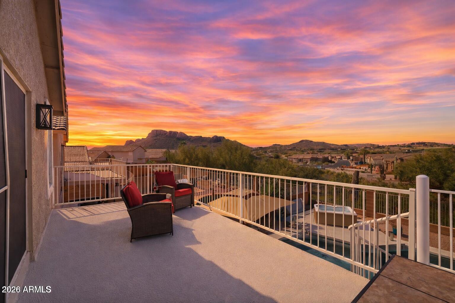 What if your backyard had no rear neighbor--just open fairway views and the Superstition Mountains?

This updated home delivers rare privacy, natural light, and flexible living with an updated kitchen, refreshed baths, and two spacious living areas.

Upstairs, the primary suite features a private balcony with sweeping golf course and mountain views--perfect for sunrise mornings or sunset evenings.

Out back, it feels like a private resort: pool, spa, covered patio, built-in BBQ, and pergola with bar seating--all set against breathtaking desert scenery.

With a new roof and exterior paint (2024) plus a new water heater (2025), it's move-in ready with the big items already done.

Home also make for a great vacation rental (VRBO or AirBnB)