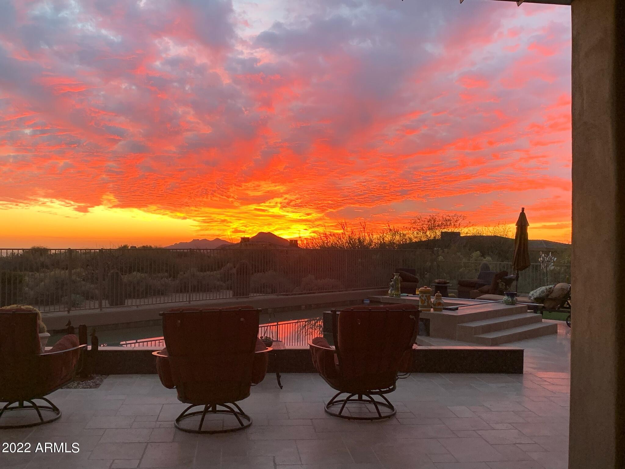 Stunning remodel on a quiet cul-de-sac perfectly nested on 1.09 acres offering commanding sunset, mountain & city light views inside the gates of north Scottsdale's greatest lifestyle community, Desert Mountain. ***Golf Membership Available.*** Serene location with transformed open great room complete with new Arizona doors for easy access to covered outdoor living. Spacious cook's kitchen enjoys fabulous natural light & huge center island, 1100 Bottle Wine Cellar, outdoor kitchen, extremely long lap pool & side yard. Luxe Master suite complete w/ Steam Shower & adjacent office.  The ultimate Guest Retreat offering 2 Separate Guest Wings: Back wing: 3 En-Suite BRs, private entrance & game room. Front wing: 2 en-suite BRs w/pool... access. Oversized 3 Car Garage can be expanded. 

See Document tab for list of upgrades. 

See Document tab for more information regarding Membership at the Desert Mountain Club. A 30 Day application review is required.