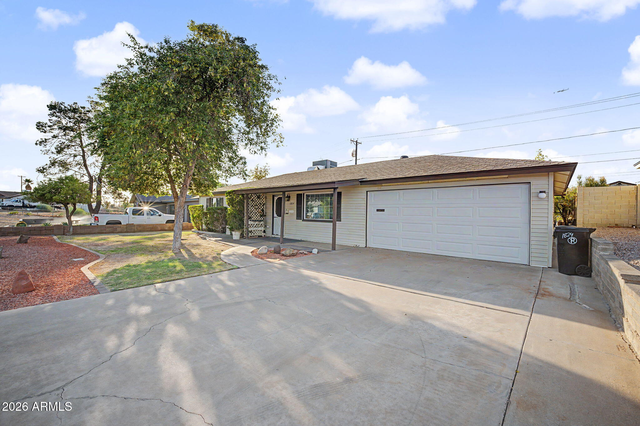 NO HOA,  Original owners since 1960 & ready for your style, but the big stuff is already done: new roof (2026) w/ 10-yr warranty, sewer line replaced (2024), water heater (2023), HVAC, Lennox 4-ton 16 SEER, (2020), new garage door (2023), & copper plumbing throughout w/ laundry plumbing updated (2024). Focus your budget on paint & finishes, not the expensive stuff behind the walls. Bonus: an amazing backyard workshop, perfect for hobbyists, makers.  A true Mesa original w/ decades of pride of ownership & the heavy lifting already done. Home this well taken care of don't last long. Seller will review offers on July 11th.