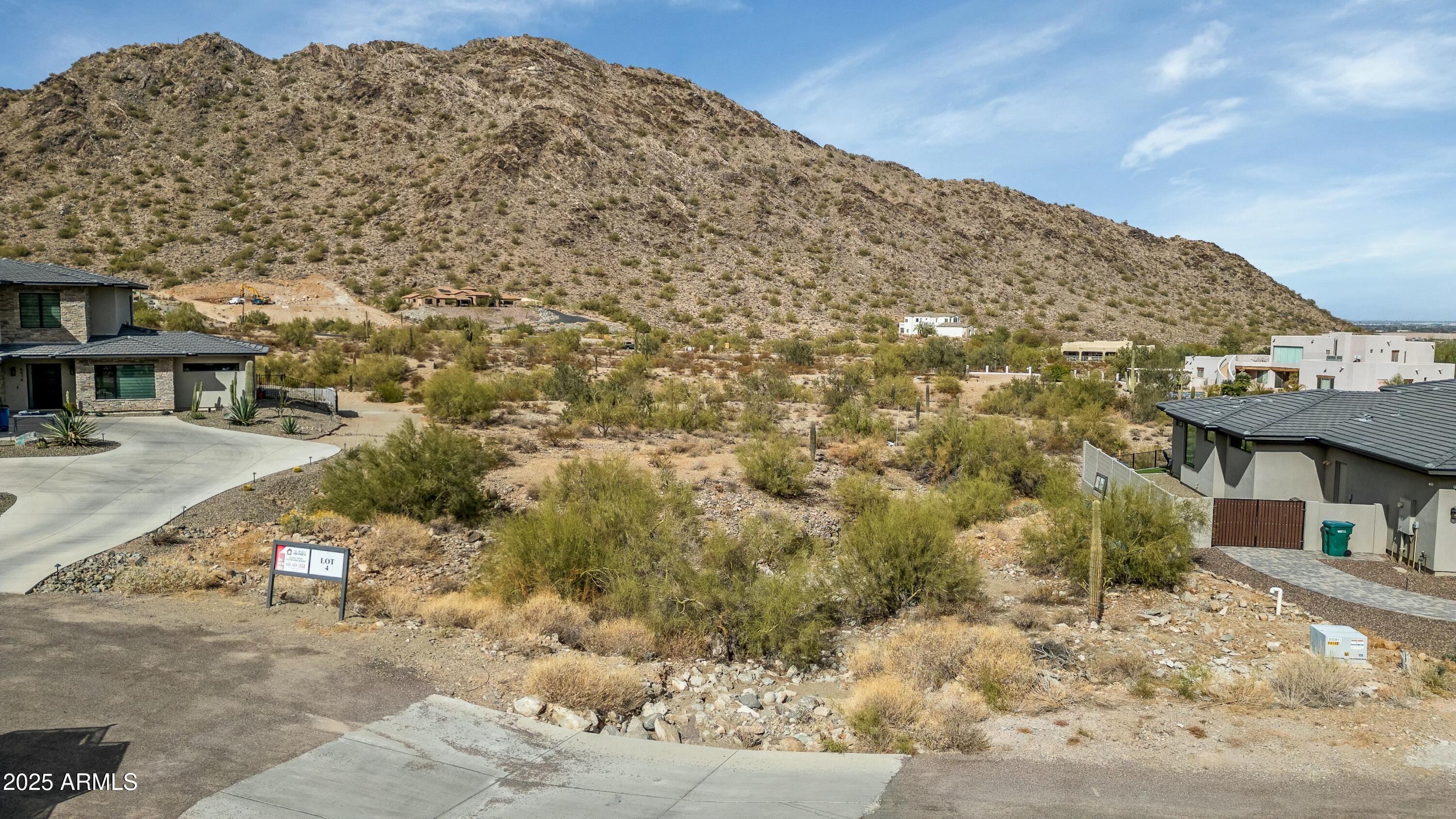 Stunning Hillside Lot with Breathtaking Views in a Gated Community. Nestled in the heart of the San Tan Mountains, this exceptional hillside lot offers panoramic views of city lights, the Superstition Mountains,  Four Peaks Mountains,  Located in a desirable gated community (with no HOA), this property is adjacent to the San Tan Mountain Regional Park, providing access to miles of hiking, biking, and horseback riding trails.
Enjoy the serenity of county living, yet with all the modern conveniences nearby—including shopping, dining, golf, and more. This lot offers the perfect balance of peace and tranquility under the stars, with easy access to everything you need. Don't miss the opportunity to own this rare gem!