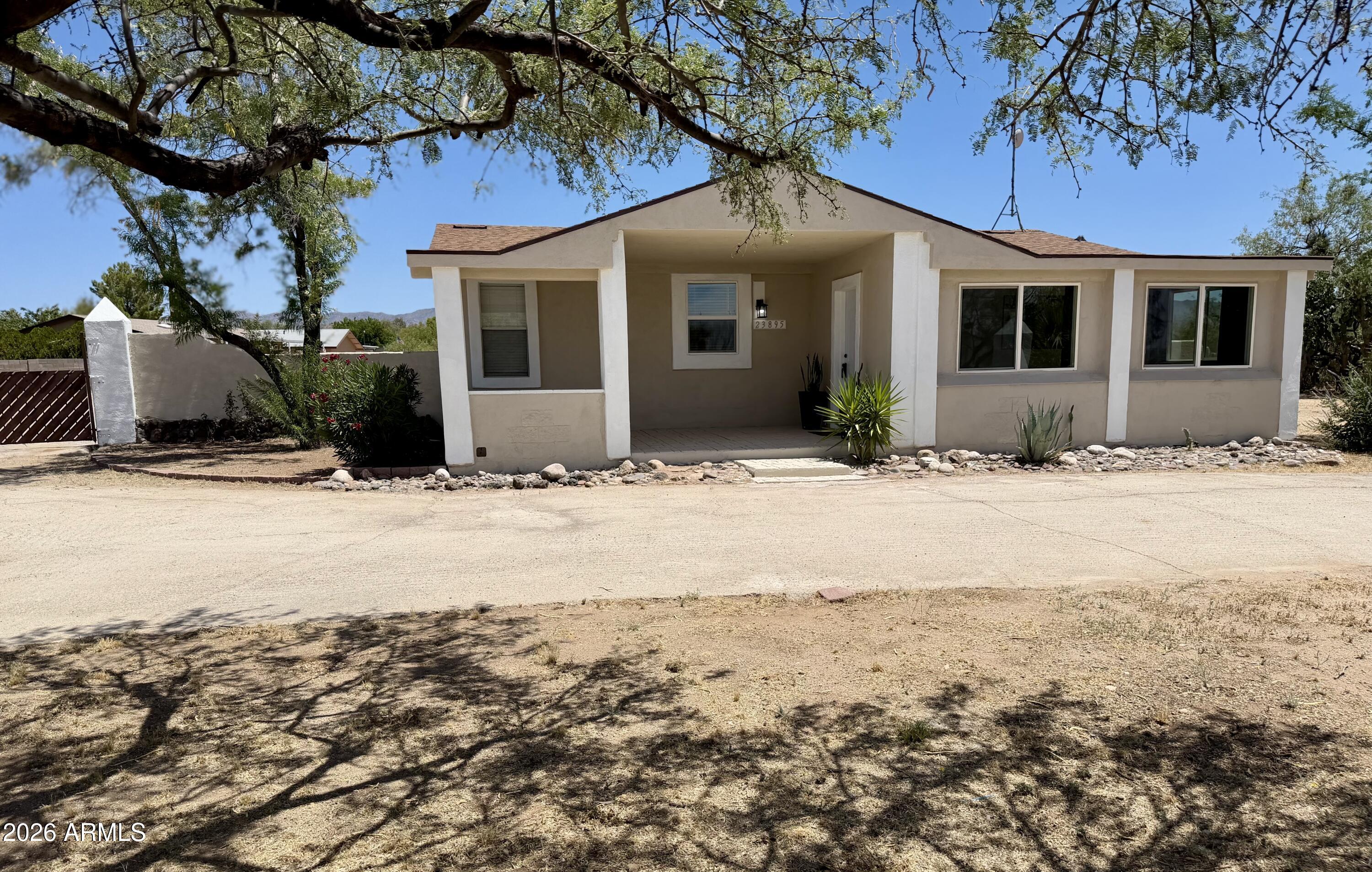 This beautifully remodeled 3 bedroom, 2 bath home sits on .66 acres with no HOA in the peaceful Paso Del Sol community of Congress, just 18 miles from Wickenburg. The open-concept kitchen features brand-new cabinetry, granite countertops and stainless steel appliances. Both bathrooms have been tastefully updated with modern vanities, showers and fixtures. The desirable split floor plan and quality laminate flooring throughout add both comfort and style. Step outside to enjoy expansive mountain views and a spacious backyard fully enclosed with a block wall. The property also includes a workshop, chicken coop and ample room for RVs, trailers and off-road toys. Experience the beauty, tranquility and small-town charm this area has to offer. This turnkey property is ready to welcome you home.