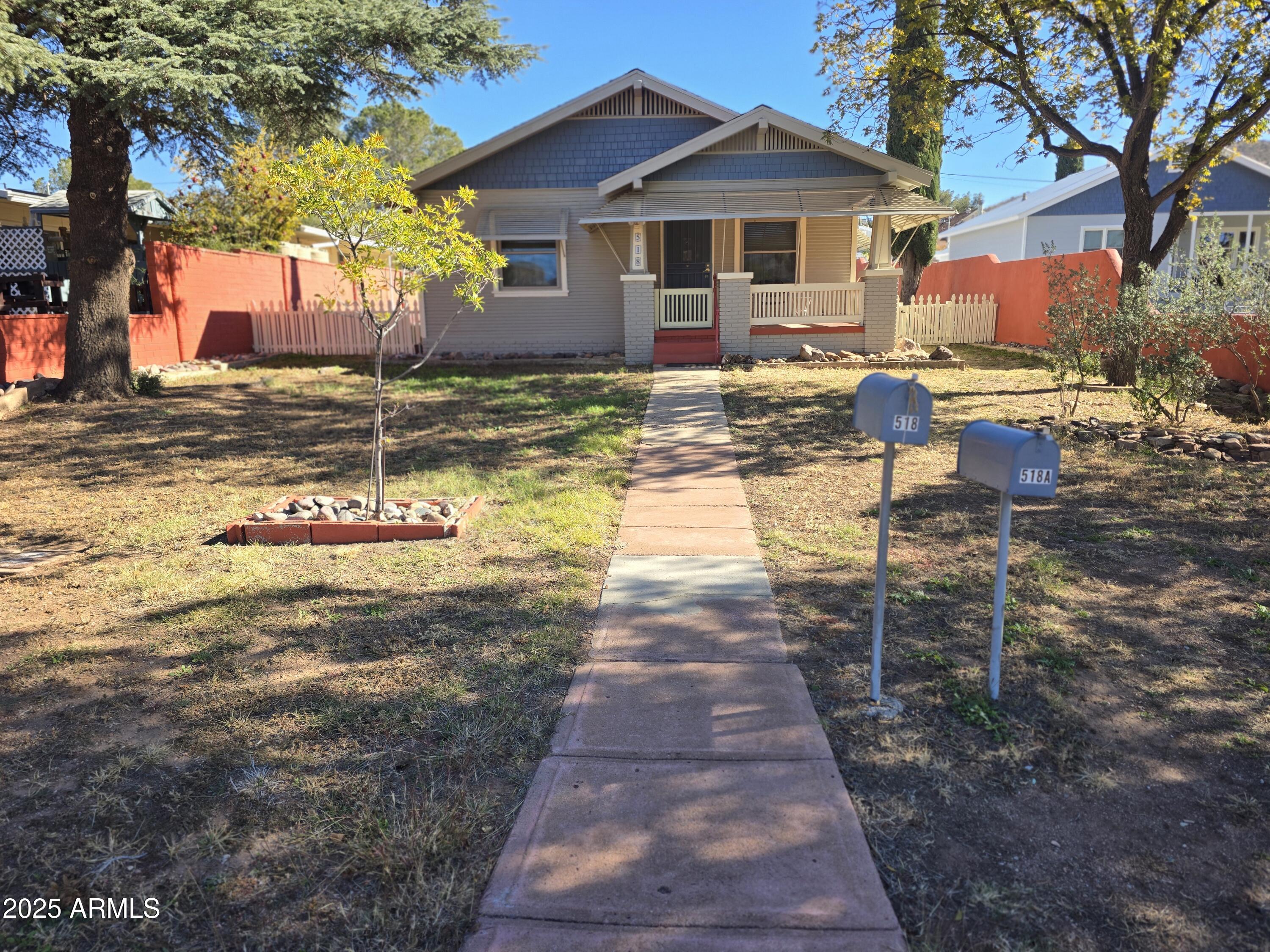 Charming home with Guest house and detached shop in Desirable Warren neighborhood. Large lot with parking, easy one level entrance. Main home has 2 large bedrooms and one bath, large open living area with hardwood floors.  Open kitchen with updated appliances and attached laundry / mud room.  Guest house has 1 bedroom and one bath, separate living area and large updated kitchen. Workshop has power / 220 and gas available. Separate storage shed. Located close to shopping, restaurants, and public transportation. This property includes 518 and 518A. This is a must see property.