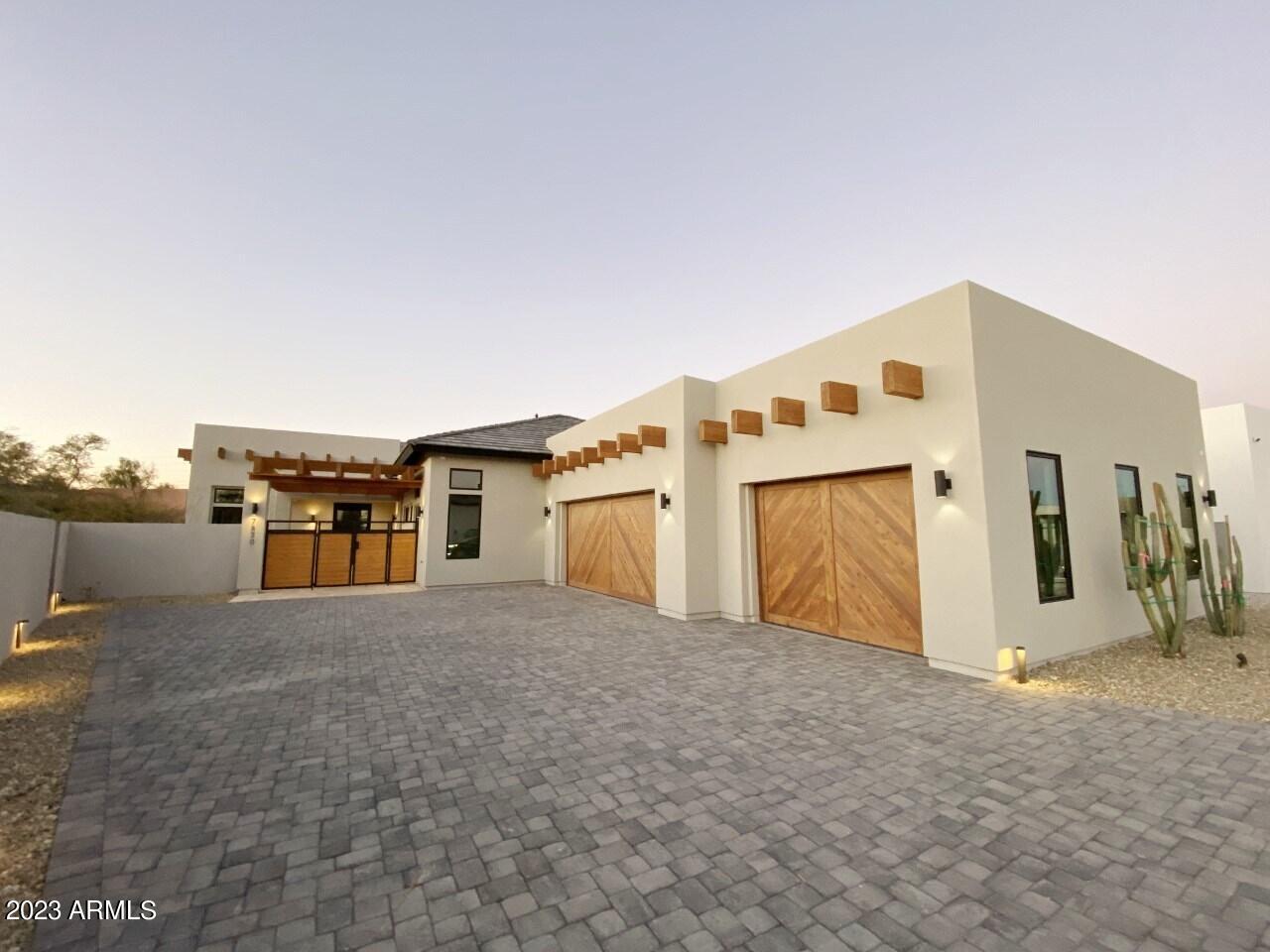 ABSOLUTELY GORGEOUS BRAND-NEW CUSTOM HOME MINUTES NORTH OF OLD TOWN SCOTTSDALE!! BUILT BY ADAMS CRAIG, THE LEADER IN ARIZONA'S GREEN BUILDING/ ECO-LUXURY STANDARD, THIS 4 BDRM, 4.5 BATHRM, 3 CAR GARAGE HOME FEATURES 4,352 SQ FT., OPEN CONCEPT FLOOR PLAN, SOARING HIGH 12' CEILINGS,  GOURMET KITCHEN THAT OPENS TO A HUGE GREAT ROOM, AND INDOOR/ OUTDOOR LIVING -- IDEAL FOR ENTERTAINING!! HOME BOASTS AN 11.75kW SOLAR SYSTEM, SEPARATE OFFICE/ DEN, PRIVATE COURTYARD, DOUBLE ISLANDS IN THE KITCHEN, GREAT RM WITH OVER-SIZED POCKET SLIDING DOOR, POOL, SPA, OUTDOOR SHOWER, AND N/S FACING LOT WITH BEAUTIFULLY LANDSCAPED YARDS.  A LUXURIOUS MASTER SUITE, WHITE OAK HARDWOOD FLOORS, AND QUARTZ COUNTERTOPS THROUGHOUT ARE ONLY A FEW OF THE HOME'S LUXURY FEATURES. VERY CENTRALLY LOCATED -- CLOSE TO ALL THAT SCOTTSDALE AND PARADISE VALLEY HAVE TO OFFER WITH NEARBY SHOPPING, FINE DINING, 5 STAR RESORTS, A+ SCHOOLS, HIKING TRAILS, AZ CANAL PATHS, AND WORLD CLASS GOLF. QUICK ACCESS TO EITHER THE 101 FWY OR SR51. EASY COMMUTE UP NORTH OR SOUTH TO THE AIRPORT. A MUST SEE!