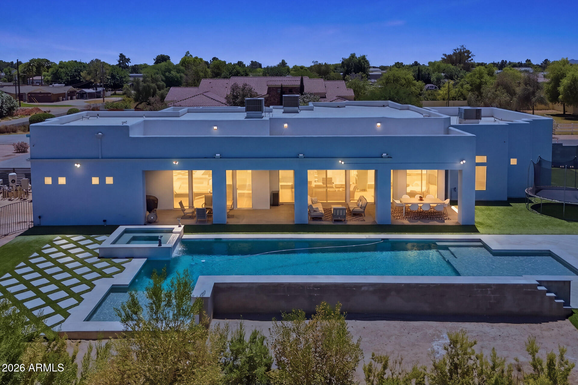 Stunning custom built on HUGE 1-acre lot w/ no HOA!!...This (4) bed (4.5) in the heart of S. Chandler and comes with all of the interior amenities you could want and expect in a property like such as Thermadore appliances in the kitchen along with top of the line cabinetry and custom built island. Huge primary sweet with beautifully designed walk-in shower. The backyard boasts a custom one-off pool with water features/spillways as well as spa.
Thousands of square feet of turf for play of relaxing. And one added benefit of this huge backyard is that theres still room for more. You can easily add a Casita for family or guests, or another garage space for cars or RV's. The possibilities are endless, just decide what you want to build! Shopping, restaurants, schools, all within minutes.
