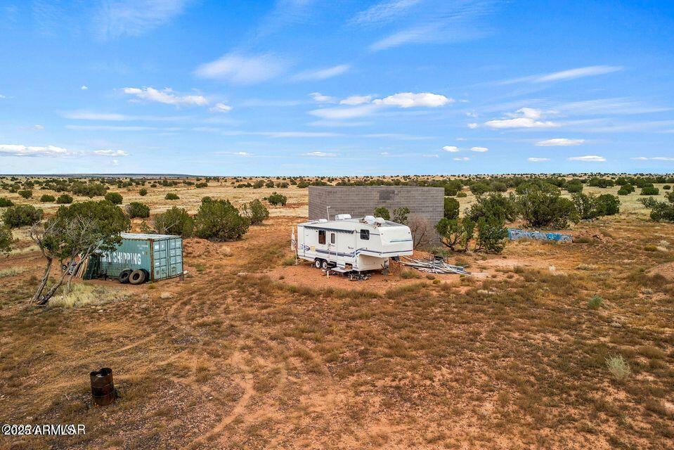 A great corner lot at the entrance to Antelope Valley with a home that has already started. Septic is installed and a well is already drilled, and it is completely fenced, just complete it and move in. Your only 24.5 miles from Heber/Overgaard and the National Forest. Property has multiple gates for easy access to any area of it. Bring your horses and go riding in the surrounding area. Come take a look!