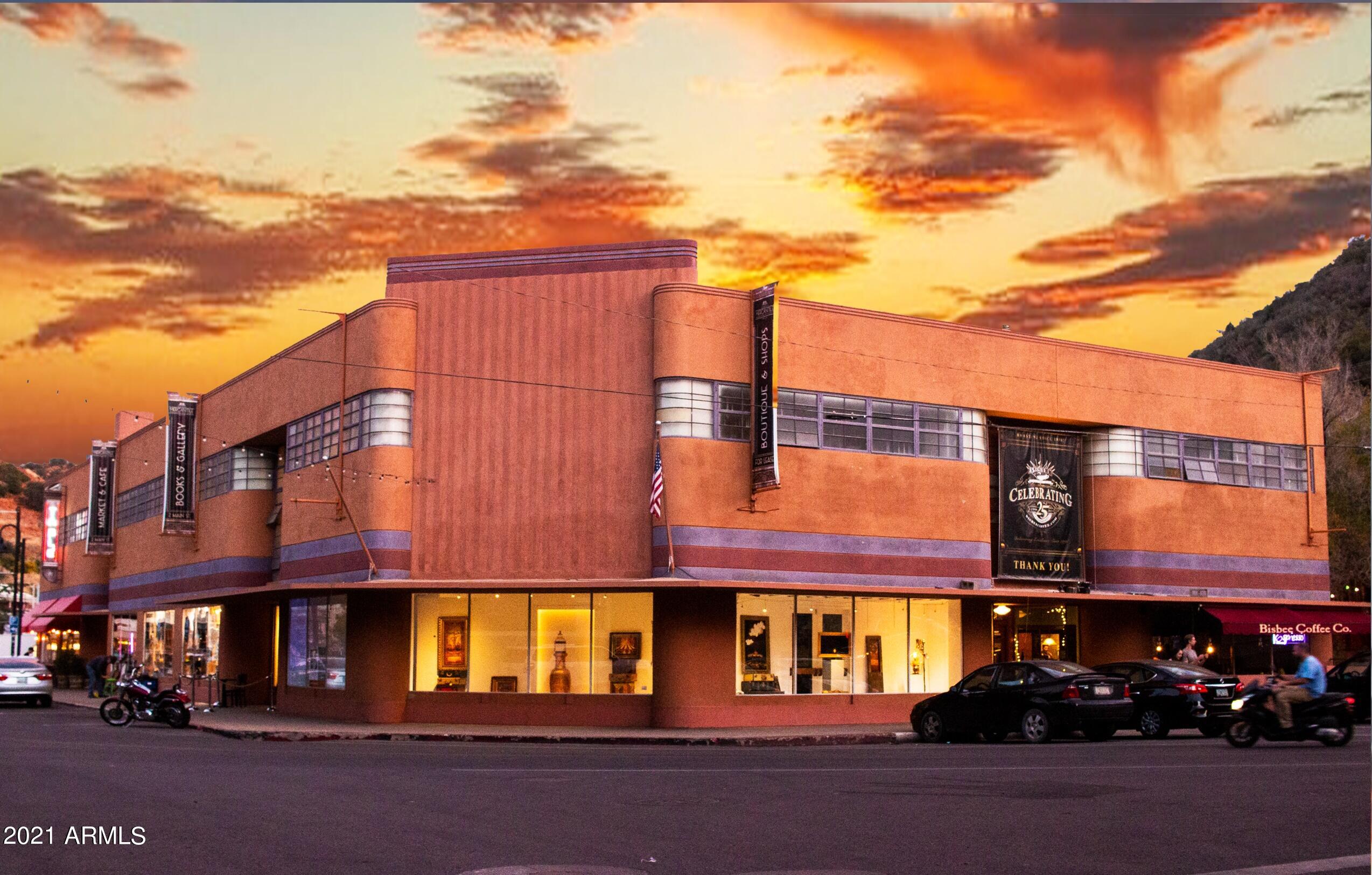2 Main Street is the cornerstone building of Old Bisbee. Built in 1938 by Del Webb, it originally housed the retail shops for Phelps Dodge Corporation.  Now, it is the center of downtown with 2 anchor restaurants, retail, an art gallery, small market, bookstore, radio station, various offices and more. Currently 14 businesses occupy the 31,000+ sq.ft. building (including basement).
The showcase windows surrounding the building have the best exposure in town.  This location is the pulse of the Old Bisbee Historic District.  County shows 31,959 sq. ft. (11,971 1st floor, 7,738 Mezzanine, 12,250 Basement). Property includes 40 parking spaces.