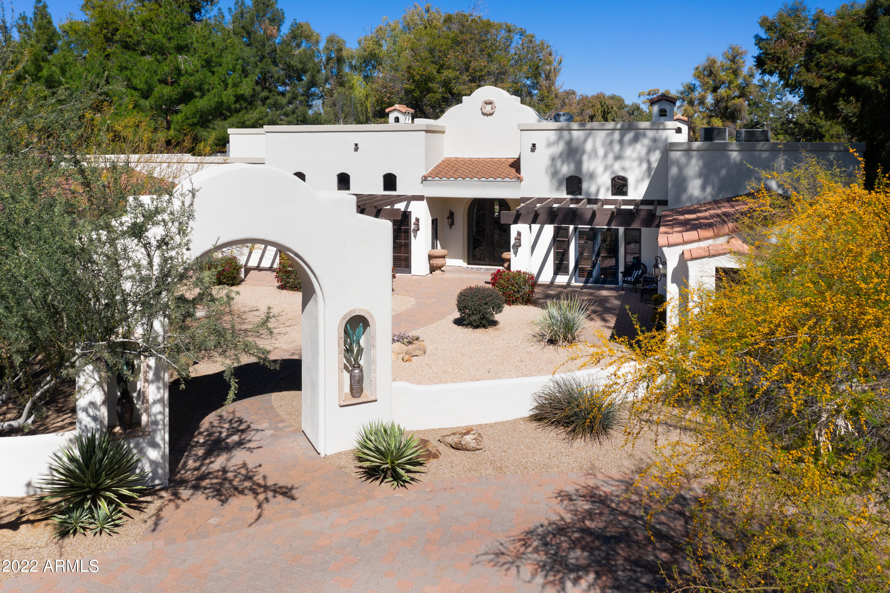 Property boasts over 6700 Sq. Ft. on 10th fairway of the Orange Tree Golf Course on over an acre!
-Over-sized 4 car garage and amenities GALORE!
-Beautiful finishes and craftsmanship & appointed with beautiful architectural details such as a stone barrel ceiling and solid Mesquite wooden doors
-Fabulous flowing indoor/outdoor living plan w /split Master Suite.
-Attached casita w/separate entrance
Backyard has tennis court, fire pit, tons of play space, pool and spa with heating & cooling system!
-Located on quiet cul de sac in a FABULOUS location!
-Recent mechanical upgrades: roof redone/ACs brand new, court resurfaced