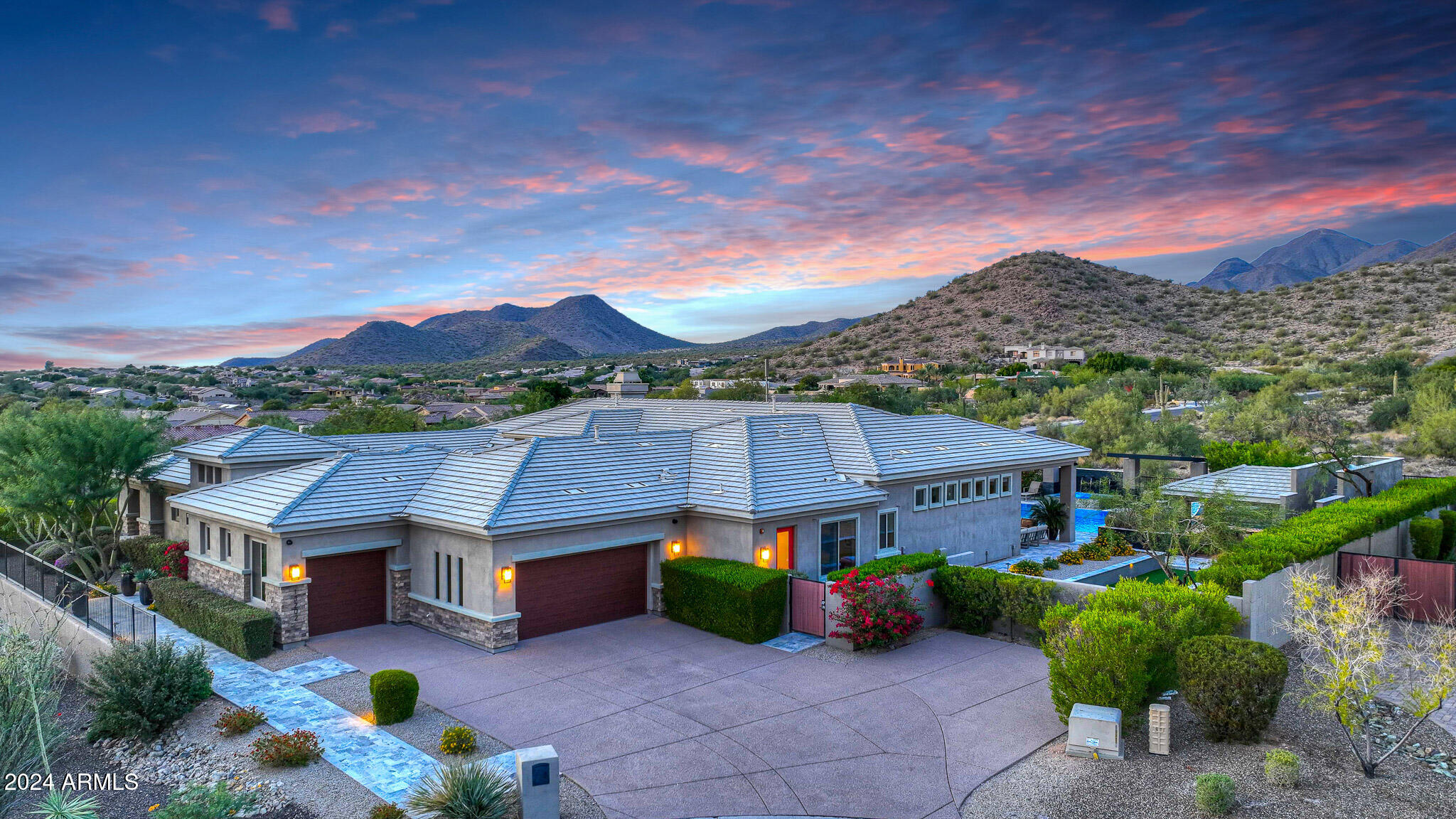 Built in 2016, this single level stunner is located at the end of a beautiful private cul-de-sac lot in the gated community of Rancho Terrasina, with only 15 custom estates. Privacy abounds with an enclosed entry courtyard and incredible resort yard, blending seamlessly with unobstructed mountain views. Three ensuites, an office and a bonus room in the main house, plus the casita with a bonus room off the courtyard! Chefs kitchen open to the north exposure backyard with sliding doors across the back bringing the outside in and allowing for endless hours of fun with the resort style heated spa, large lap pool, swim up bar, sunken ramada, BBQ area, Bocce court, and water slide! Plenty of grass for playing and down-valley city views from your owner's retreat hot tub off the primary bedroom! Available fully furnished separate bill of sale!