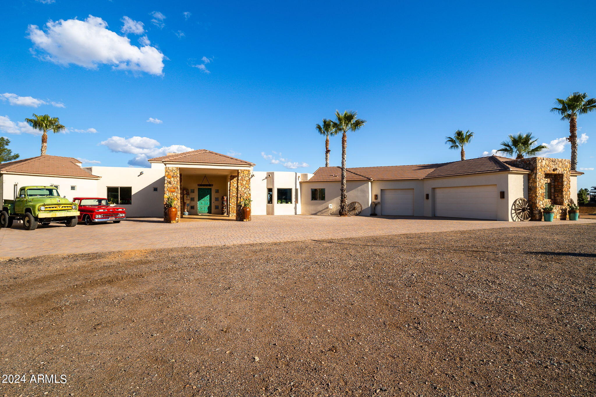 Welcome to this Extraordinary Horse Training Facility in the heart of the Beautiful Rio Verde Foothills Horse community. Paved Road to the custom Gated Entry leading to the gorgeous southwestern home, resort style backyard with sparkling new pool is great for relaxing after a long day on the ranch. A 140'x240' COVERED arena, 150'x240' outdoor arena, 100'& 65' round pens. Hot walker. GREAT WELL !!!
2-150'x80' turnouts 3-120'x60' turnouts. 20 stall Show barn, 2 Barn Apts. Barn has natural stone and covered patio. a 4 stall mare motel with turnout. Plenty of hay storage, Large shop, RV plugs and so Much More !! Purchase the front 9.17 acres for $3.8 million or the entire 19.17 acres for $4.8 million.
 Breathtaking mountain and desert 
views that are truly captivating.