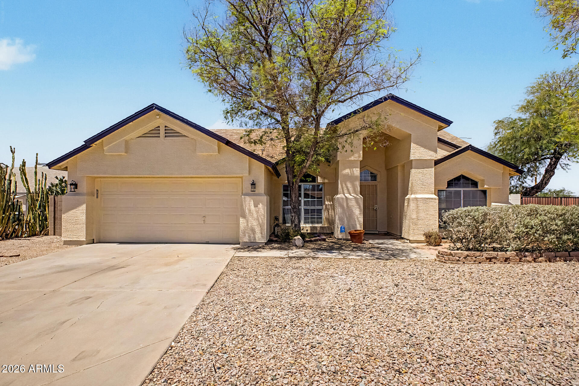 Corner lot, no HOA, RV gate, and a convenient Mesa location near Red Mountain area amenities. This 3 bedroom, 2 bathroom single level home offers a bright, functional layout with vaulted ceilings, large windows, and connected living spaces that make everyday living easy. The kitchen sits at the heart of the home with granite counters, stainless steel appliances, and good flow into the main living area.

The primary suite includes dual sinks, a soaking tub, and separate shower. Out back, the covered patio, pergola area, storage, and usable yard space give you room for toys, pets, projects, entertaining, or future upgrades. Close to golf, parks, shopping, dining, Usery Mountain trails, Salt River recreation, and freeway access.