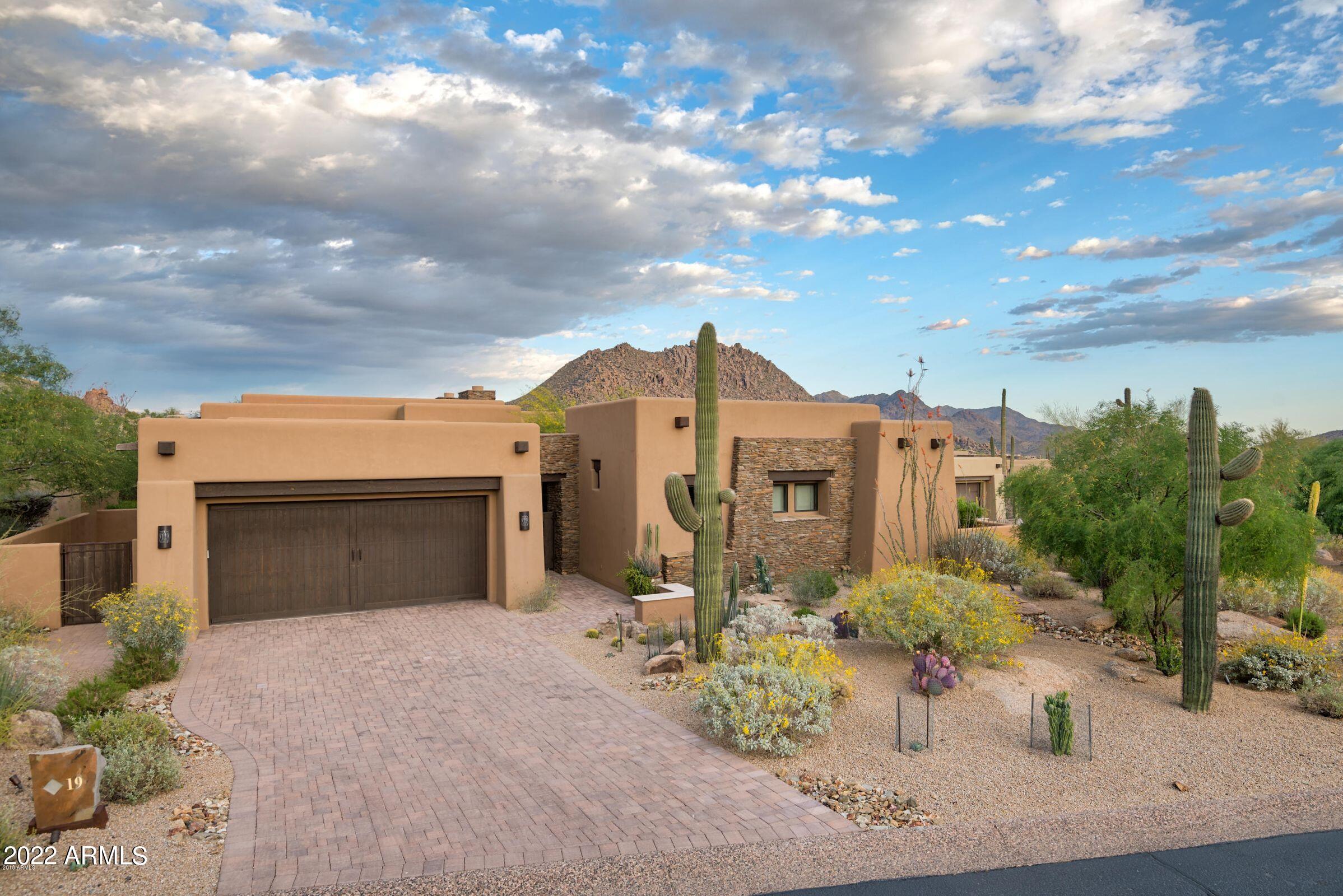 Exquisite home in gated Privada, next to the Four Seasons North Scottsdale. Views all around, of Troon Mountain from the backyard, and Pinnacle Peak from the inviting courtyard with firepit and water feature. Open floorplan with disappearing glass wall welcomes indoor/outdoor living. Master suite is grand, with walk-in closet and sumptuous tub, dual sinks and walk-in shower. Junior master includes walk-in closet and generous room that can accommodate two queen beds. The casita is detached and will delight any guest, with their own access to courtyard relaxation. Finishes are top notch: Wolf appliances, Subzero frig, and travertine flooring inside and out. Owner has added $500K of features, including smart home system and auto blinds throughout just to name a few. Photos to come...
