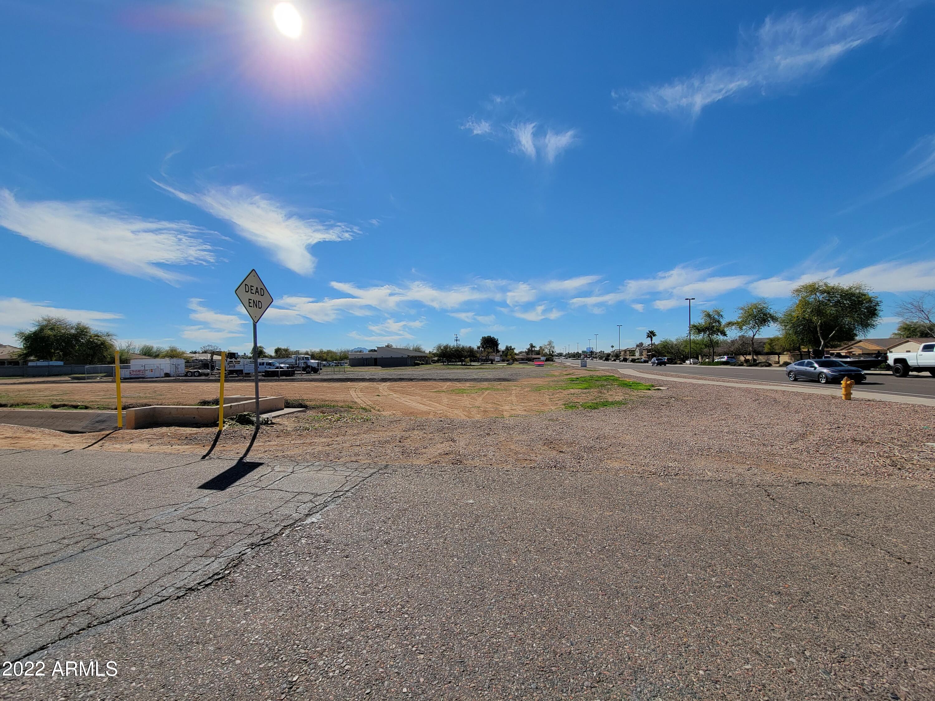 This property has over 600 feet of frontage on Gilbert Road with East West Exposure. Property is currently owned by a religious group and is the reason the taxes are exempt. Buyer to verify actual taxes during due diligence period. Perfect location for Commercial, Multi-Purpose or Multi-Family opportunity. Lot is on Maricopa County Island and is currently zoned R-43.