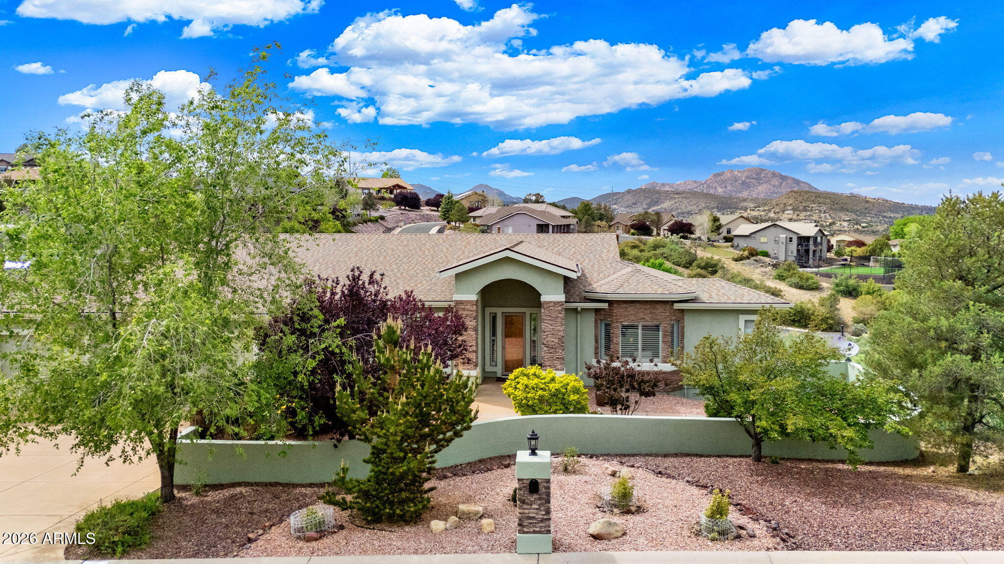 Refined Prescott living with panoramic mountain views and no HOA, ideally positioned close to everything while offering privacy and space. This thoughtfully updated residence showcases a true chef's kitchen appointed with a Wolf range, Sub-Zero refrigerator, and Bosch dishwasher--designed for both everyday living and elevated entertaining. Updated flooring brings warmth throughout this beautiful home. Bedrooms are thoughtfully designed with three including an ensuite bathroom. 
Outdoor living is equally impressive, featuring a spacious view deck and covered patio that create a natural extension of the interior--perfect for sunset gatherings or quiet mornings. The fenced grounds with dedicated dog run offer both function and flexibility, while the 3-car garage provides ample space for vehicles, storage, or a curated collection.
A rare opportunity to own a move-in ready home that blends quality, comfort, and location in one of Prescott's most desirable settings.