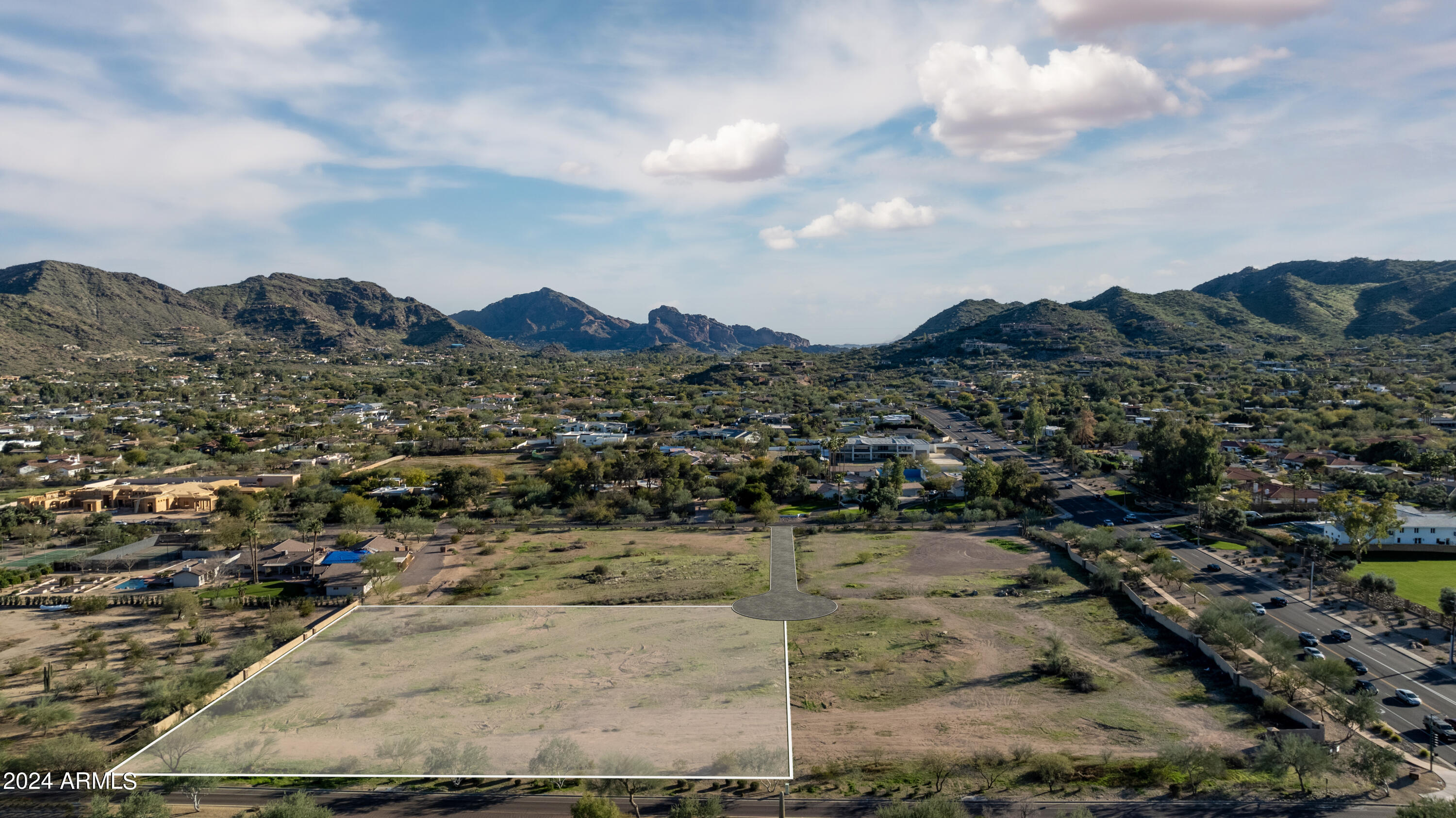 2.1 ACRE FLAT LOT - Discover beautiful modern living at Mummy View Estates in Paradise Valley, a BedBrock Luxury Community. As one of four exclusive homesites, this premier parcel offers a blank canvas awaiting your vision for a custom residence. Whether your aspirations include sprawling yard space, a grand showcase garage for your prized automotive collection, or a family estate, this is your opportunity to design and build a custom dream home with award-winning home builder BedBrock Developers. Situated just minutes from world-class fine dining, gourmet markets, refined shopping experiences and impressive golf courses, this location perfectly blends serene panoramic views with indoor-outdoor living and convenient access to high-end comforts and amenities.