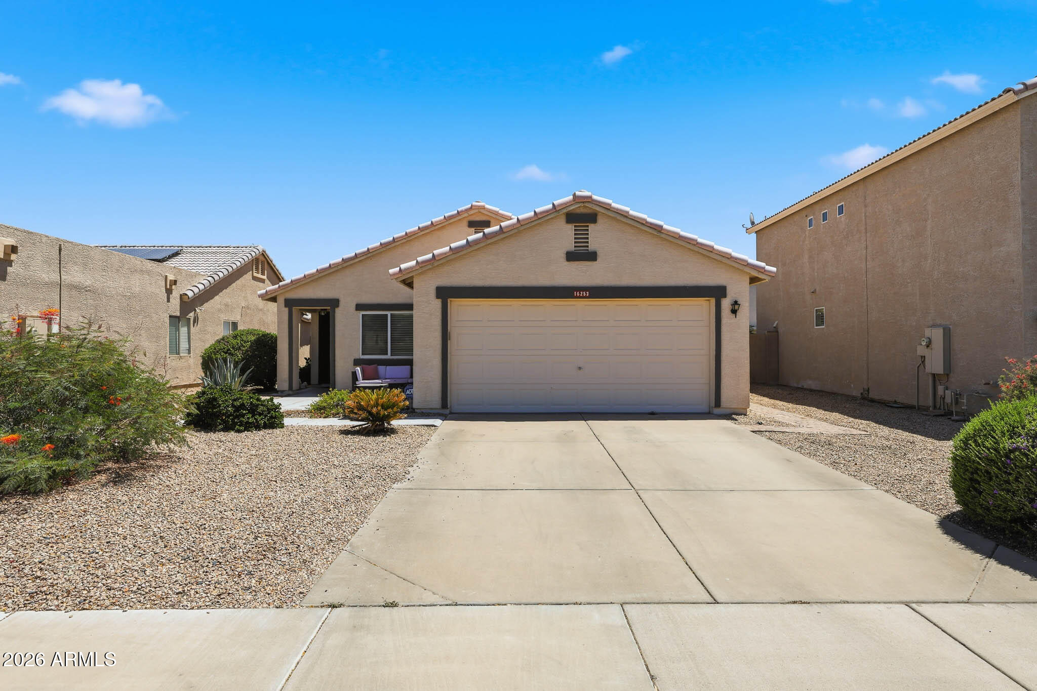 If you've been dreaming of owning your first home, this one checks a lot of boxes and it's ready and waiting for you. Nestled in the established Sarival Village neighborhood, this 3-bedroom, 2-bathroom home offers 1,204 square feet of comfortable living space with a layout that just works.
Step inside and you'll notice right away how light and open it feels, thanks to the vaulted ceilings that give the main living area a roomy feel that you wouldn't expect from the outside. The kitchen is a standout granite countertops, stainless steel appliances, a pantry for all the extras, and an eat-in dining area that makes everyday meals feel easy and connected.
Each bedroom features laminate flooring and fresh paint, so you can move right in and make it your own without a long to-do list waiting for you. The single-story layout means no stairs to worry about.  
Outside, you've got a manageable yard with room to relax, garden, or just let the kids run around. And with quick access to the I-10, you're just minutes from shopping, dining, schools, and everything the West Valley has to offer.
Homes like this move-in ready, in a great location, at an approachable price point don't sit long. Come see it for yourself!