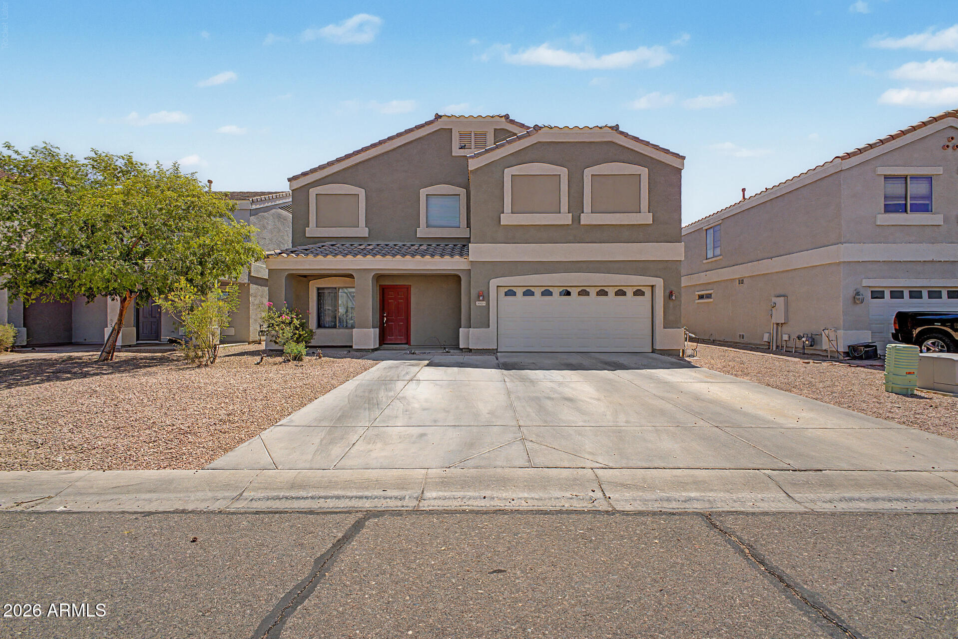 Welcome home to this spacious 6-bedroom, 3-bath home offering comfort, flexibility, and exceptional pride of ownership! The open-concept floorplan features a bright living area, tile flooring, neutral finishes, and a beautifully appointed kitchen with wood cabinetry, subway tile backsplash, pantry, island, and breakfast bar. The desirable main-level suite provides privacy, while an additional downstairs bedroom and full bath are perfect for guests or multigenerational living. Upstairs offers a versatile loft for a game room or office along with 4 bedrooms. Enjoy no rear neighbors, a covered patio, and a backyard ready for your dream outdoor retreat. Leased solar helps keep energy minimal. Must see!