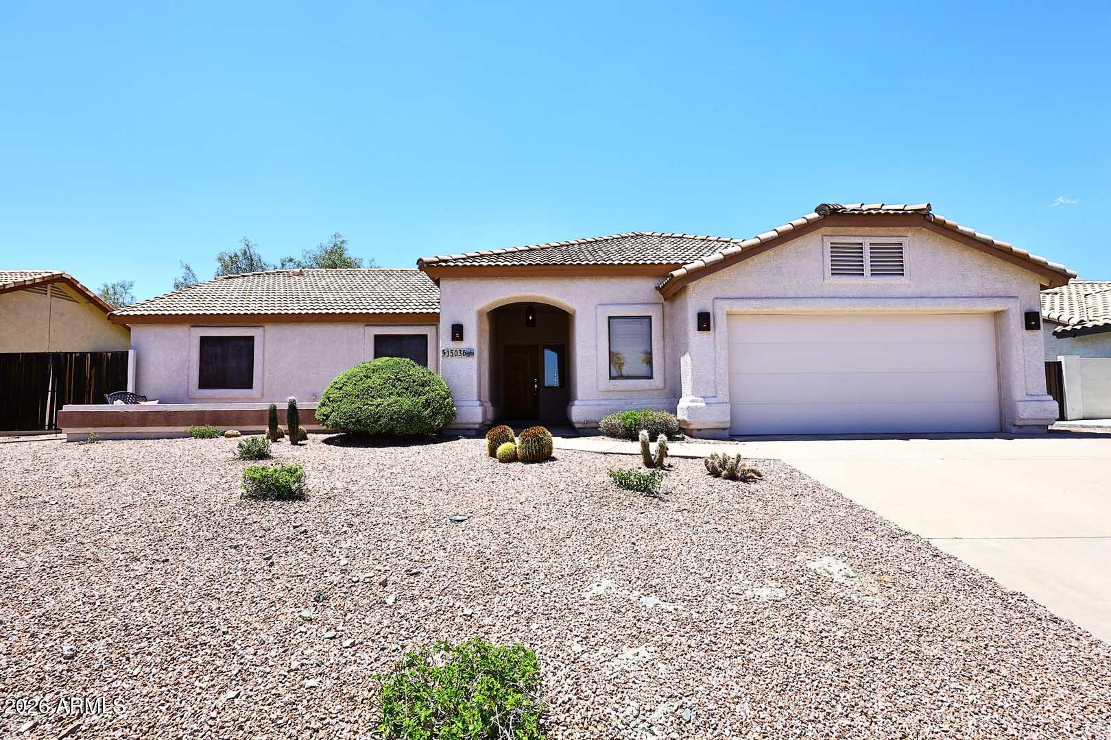 Situated on a large lot, this property showcases AMAZING mountain views from both the front patio and backyard patio, creating the perfect setting for relaxing or entertaining. A beautiful single-level home w/no steps in desirable Fountain Hills offering 3 bedrooms, 2 bathrooms of comfortable living space. This well-maintained home features  a cozy living room, a propane fireplace and an open kitchen with a breakfast bar, pantry, and dining area. The refrigerator, microwave, washer and dryer convey with the home, along with a water softener system. The primary suite includes a walk-in closet and full ensuite bath. The backyard features brand new turf, a charming backyard swing, and a detached roomy storage building for extra functionality and storage space. Additional features include a wide 2-car garage and this property has no HOA. This property is included in the Fountain Hills NPOA area.
Conveniently located near all that Fountain Hills has to offer,