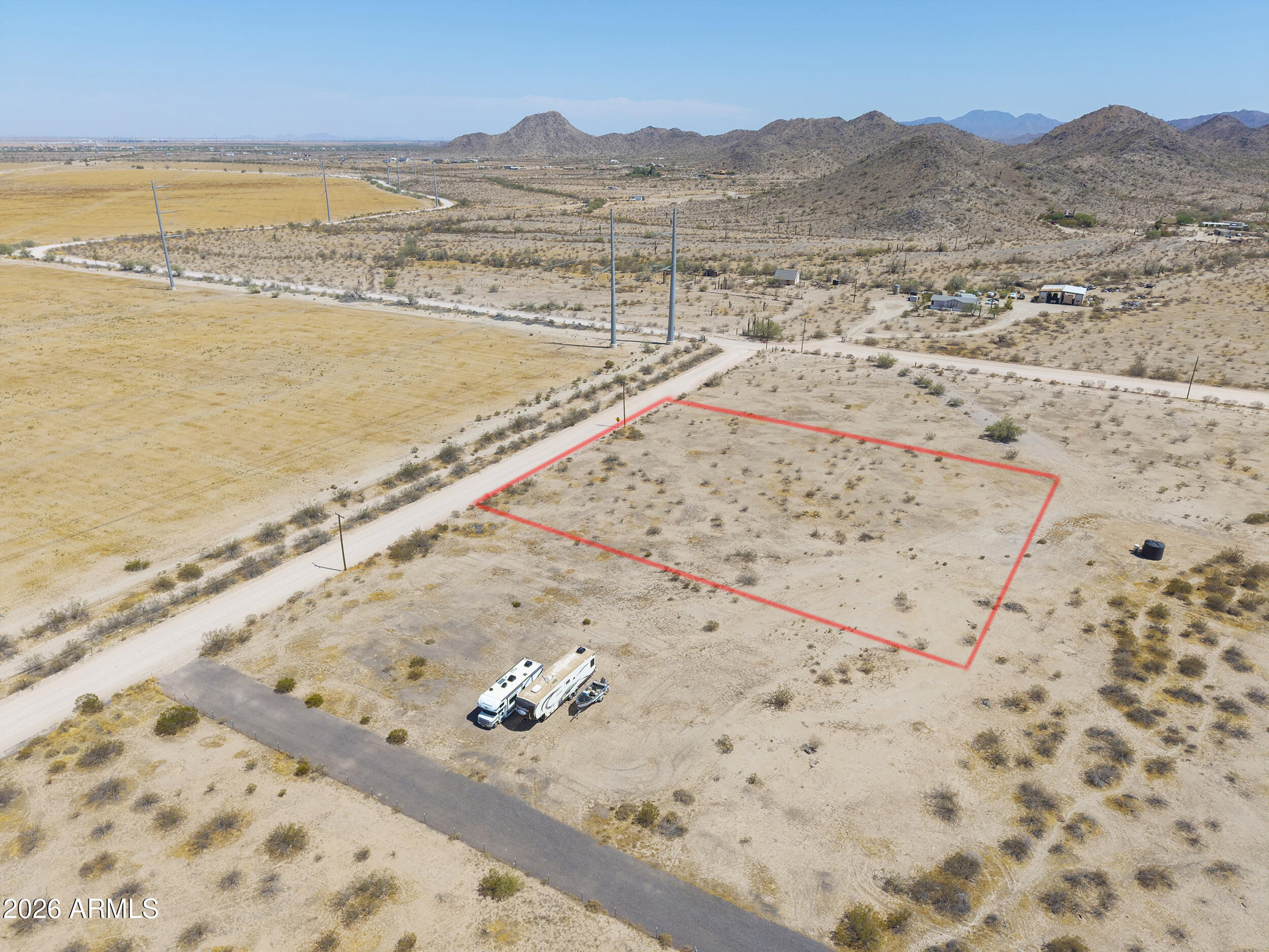 Create the desert lifestyle you've always dreamed of on this 1.24-acre parcel in Hidden Valley! This level, fully cleared lot offers shared well access, electric nearby & endless possibilities for your future. Build a custom home, create your own horse property or bring the RVs, trailers & toys--there's plenty of room to make it your own! With NO HOA, breathtaking mountain views, wide-open skies & unforgettable Arizona sunsets, you'll enjoy peaceful rural living while still being conveniently located near Maricopa & Casa Grande. Looking for more acreage? Adjacent parcels are also available, giving you the opportunity to expand your vision & create the space you've been searching for!