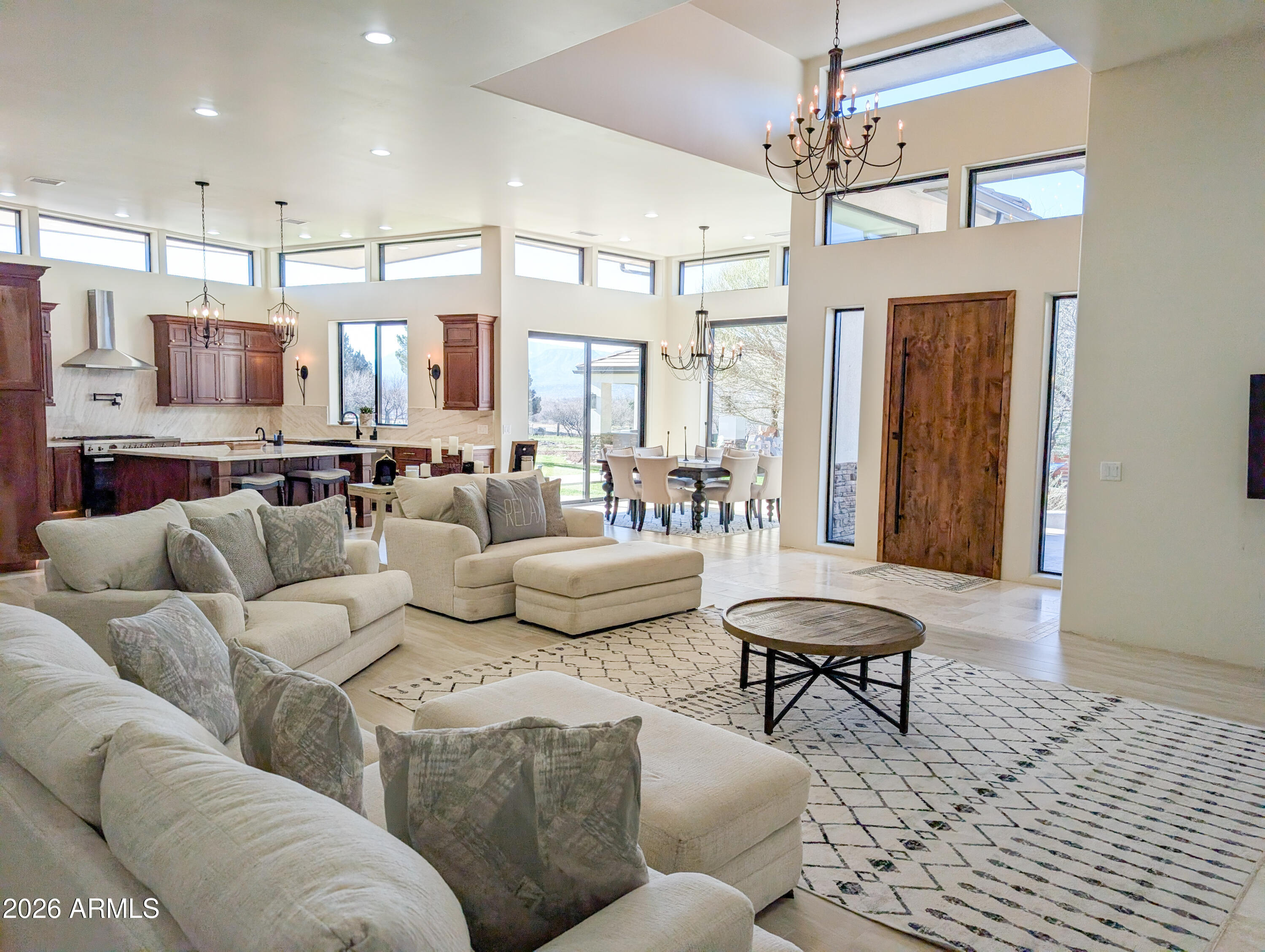 Experience luxury on 2+ sprawling acres in this stunning 3,400 sq. ft. custom home that features a seamless open concept anchored by a Chef's Kitchen with premium finishes and high-end appliances.
The layout offers 4 bedrooms and 4 baths, including a spa-like Primary Bedroom retreat complete with His & Her Walk-in Closets. Dedicated Den/Office space and a Guest Suite with ultimate privacy. Step outside to an Outdoor Kitchen, perfect for entertaining against a backdrop of sprawling, usable land. 
Property Highlights:
- 3,400 Sq Ft
- 4 Beds/ 4 Baths + Den
- Chef's Kitchen
- Laundry Room
- Dedicated Guest Suite, 2 Bds 1 Ba, w/Laundry
- Oversized Garage for trucks and toys
- Outdoor Kitchen
- Horse Property
- Backs Public Land
- Well Exists
- Fully Fenced
- Electric Gate - Large Conex Box to convey with property