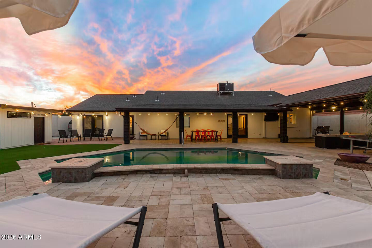 Fully renovated in 2022, this stunning home is located in a desirable non-HOA community--making it a perfect primary residence, vacation home, or short-term rental! The gourmet chef's kitchen features a spacious dining area and premium stainless steel appliances. Inside, enjoy a bright great room with vaulted ceilings and a split-bedroom floorplan. The palatial primary suite boasts a soaking tub and dual vanities.

The backyard is a private oasis with synthetic turf, a sparkling pool, water feature, and pristine travertine pavers. Complete with a rare 4-car garage and an RV gate with 50-amp hookups and sewer clean out. Best of all, most furniture is available on a separate bill of sale for a turn-key transition!