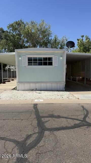 Beautifully updated in 2023, this move-in ready 2-bedroom, 1-bath home is located in one of Mesa's best-kept secret age-qualified communities! Thoughtfully remodeled with modern finishes and accessibility features throughout, this home offers comfort, convenience, and exceptional value.
Recent upgrades include drywall throughout, laminate flooring, dual pane windows, canned lighting, updated outlets/receptacles, ceiling fans, and a fully remodeled kitchen featuring granite countertops, stainless steel appliances, updated hardware/fixtures, and a tankless hot water heater. Bathroom updates include a walk-in shower with grab bars for added accessibility. Additional highlights include a Semper Fi A/C system and included washer & dryer. Conveniently located near the Light Rail with direct Conveniently located near the Light Rail with direct access to Downtown Mesa, Tempe, and Phoenix. Only a short distance from Mesa Riverview, Tempe Marketplace, Cubs Spring Training, Phoenix Rising Stadium, ASU sporting events, Salt River Fields, Scottsdale Fashion Square, and Phoenix Sky Harbor Airport.

Community lot rent is $800/month.

An excellent opportunity for affordable living in a prime location with extensive upgrades already completed!
