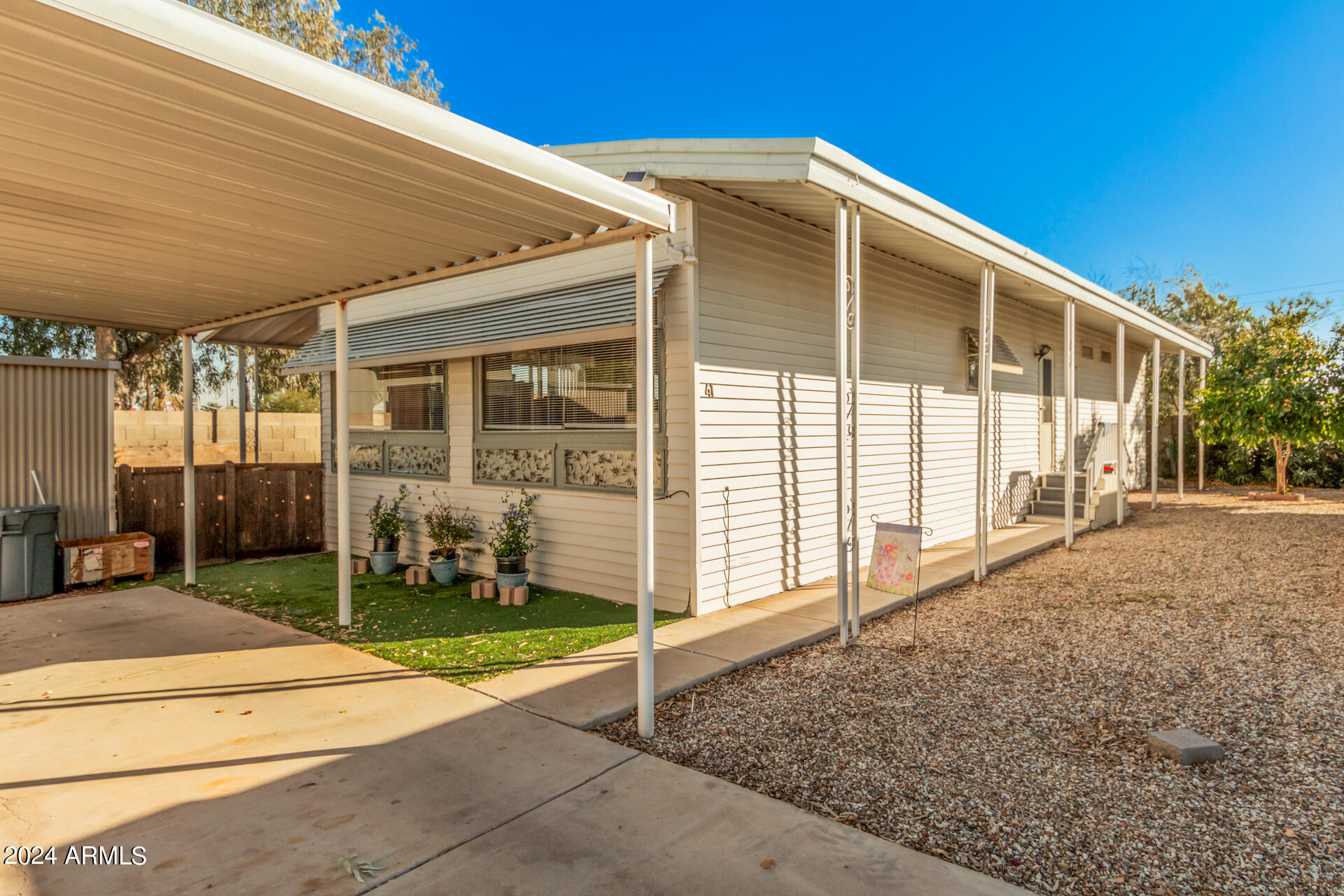 Experience convenient living 55+ Community! A charming 2-bed, 2-bath mobile home in Casa del Sol East! You'll find a welcoming living/dining room featuring wood panel walls, practical blinds, & wood-look flooring. The kitchen comes w/ Cooktop, built-in appliances, & a peninsula with a breakfast bar. The home was just Leveled and Partial plumbing replaced. The Main bedroom boasts a private bathroom with dual sinks for an efficient daily routine. Enjoy the fresh air on the deck while sipping on your favorite drink. You'll also find a handy storage shed for your tools & storage unit for your extra toys. Roof replaced 2021, Carpet 2023 & bathroom remodeled 2025. Kitchen updated 2025. Community perks include a refreshing spa,pool, fitness center,clubhouse, walking paths,& more.