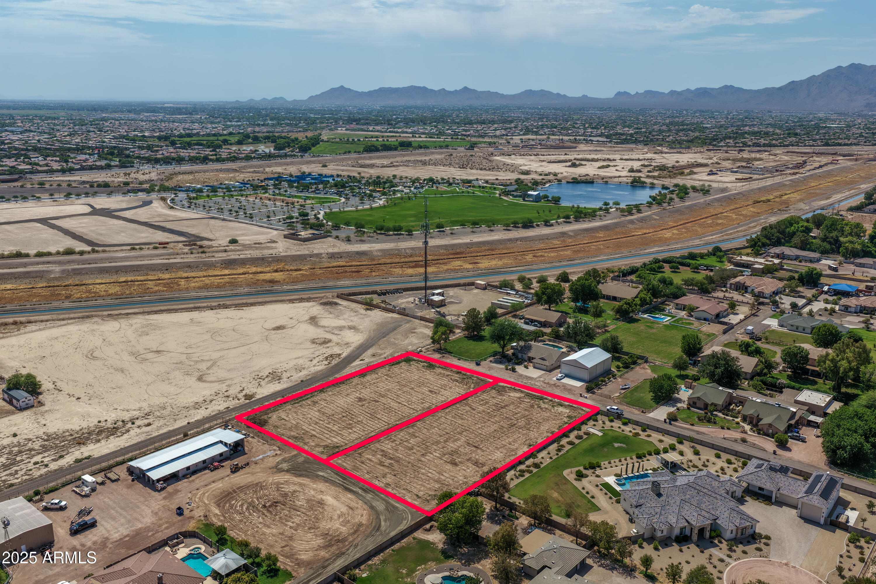 Don't miss this opportunity to own one or both of the last remaining unrestricted acre lots in Gilbert. Perfectly situated near Gilbert Regional Park with quick access to the 202 freeway between Greenfield and Higley Roads, access is off of Queen Creek Road for easy in-and-out. These rare properties offer Town of Gilbert water, SRP power, and require septic, giving you the freedom to build your dream home, casita, shop, RV garage, or more without HOA restrictions. The location can't be beat—minutes to parks, shopping, dining, and top-rated schools—making it ideal for creating a multi-generational retreat, storing your toys, or simply enjoying wide-open space in the middle of town. Acre lots in this area are almost impossible to find, and once these are gone, they're gone for good.